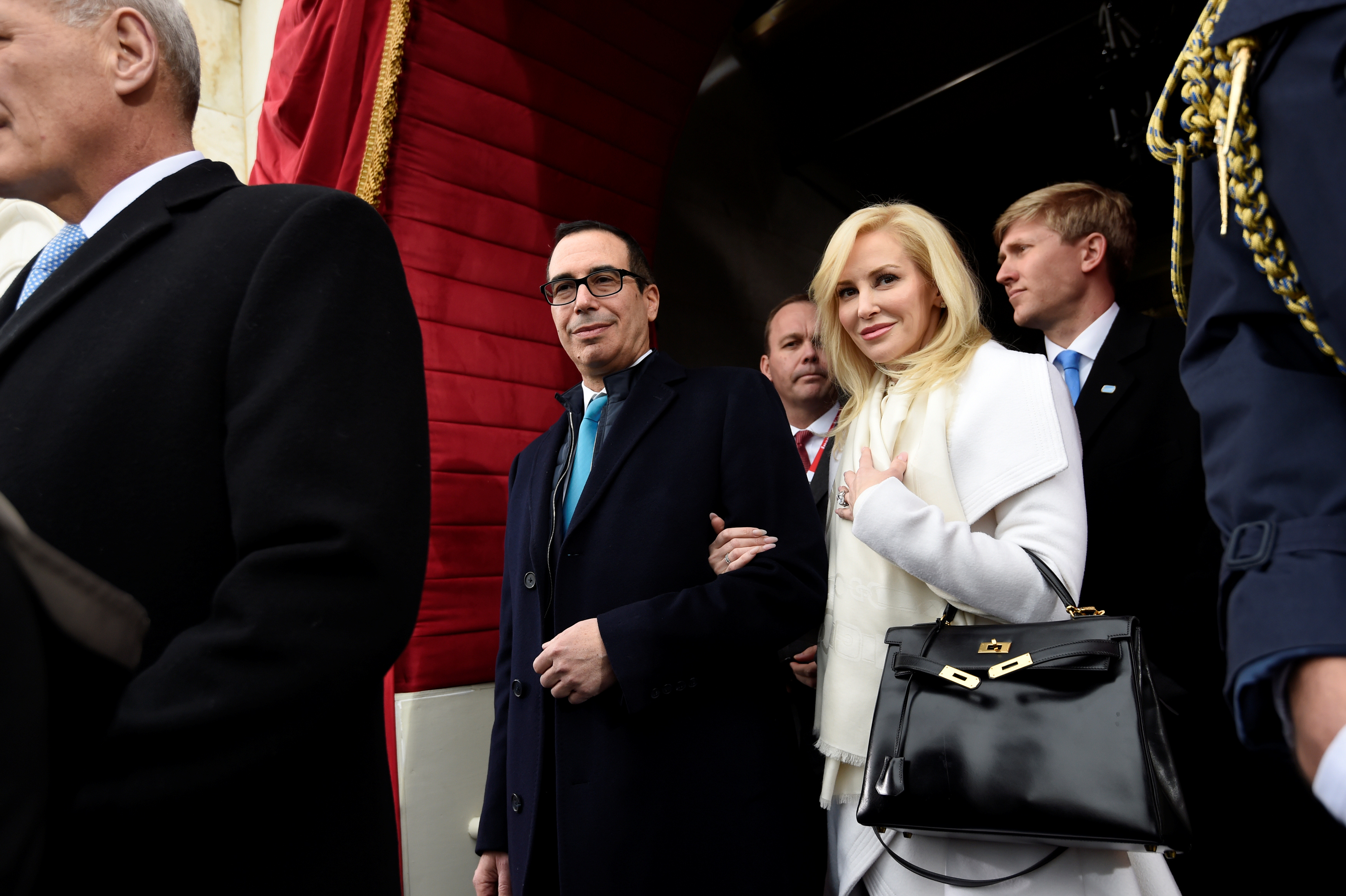 FILE PHOTO: US Treasury Secretary nominee Mnuchin and  Linton arrive for the Presidential Inauguration of Donald Trump at the US Capitol