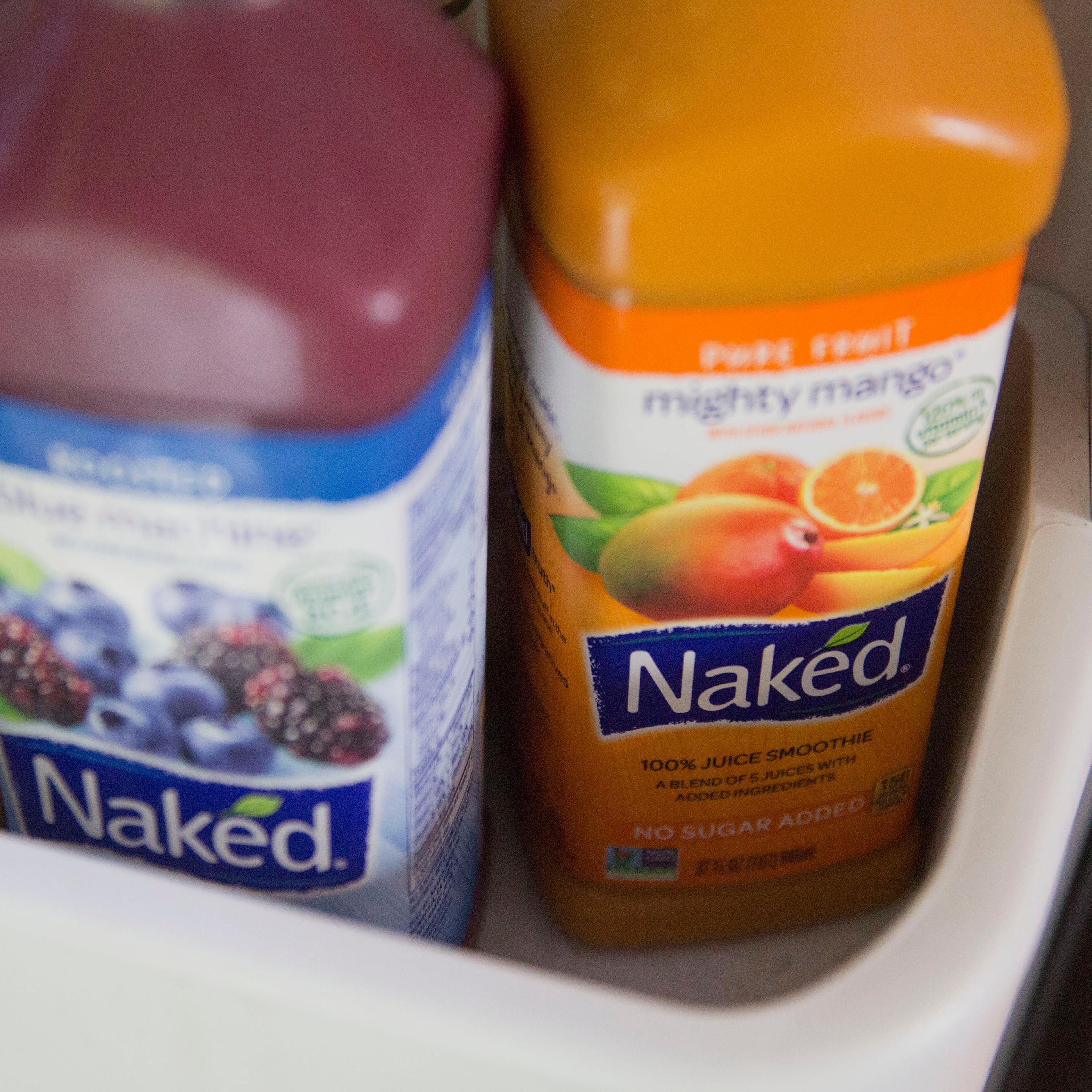 Bottles of PepsiCo Inc. Naked brand juice smoothies are arranged for a photograph in Tiskilwa, Illinois, U.S., on Thursday, July 2, 2015. PepsiCo Inc. is expected to report quarterly earnings on July 9, 2015.