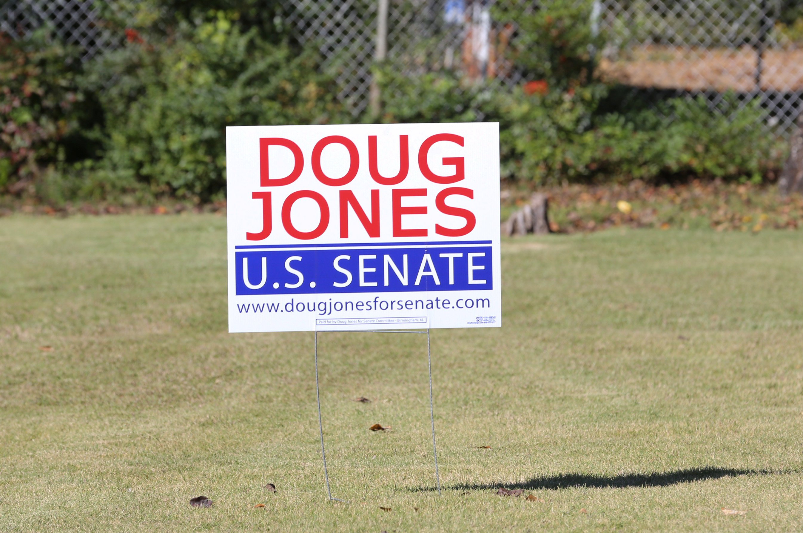 U.S. Senate Democratic candidate Jones' election sign is posted around Jefferson County prior to the upcoming special election against Republican candidate Moore in Hoover