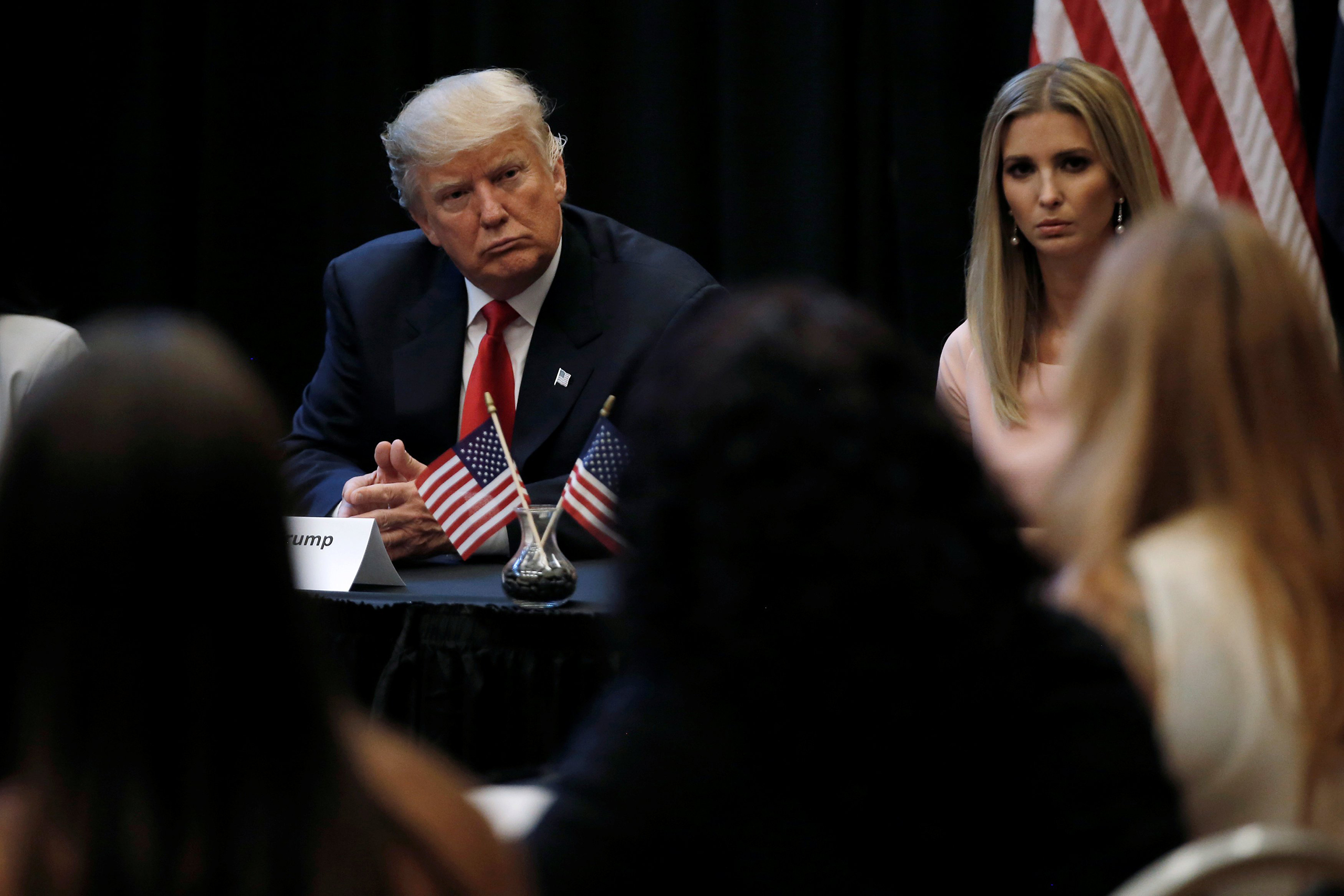 Donald Trump and his daughter Ivanka sit together as they meet with the spouses of active U.S. military members during a campaign stop in Virginia Beach, Virginia, Sept. 6, 2016.