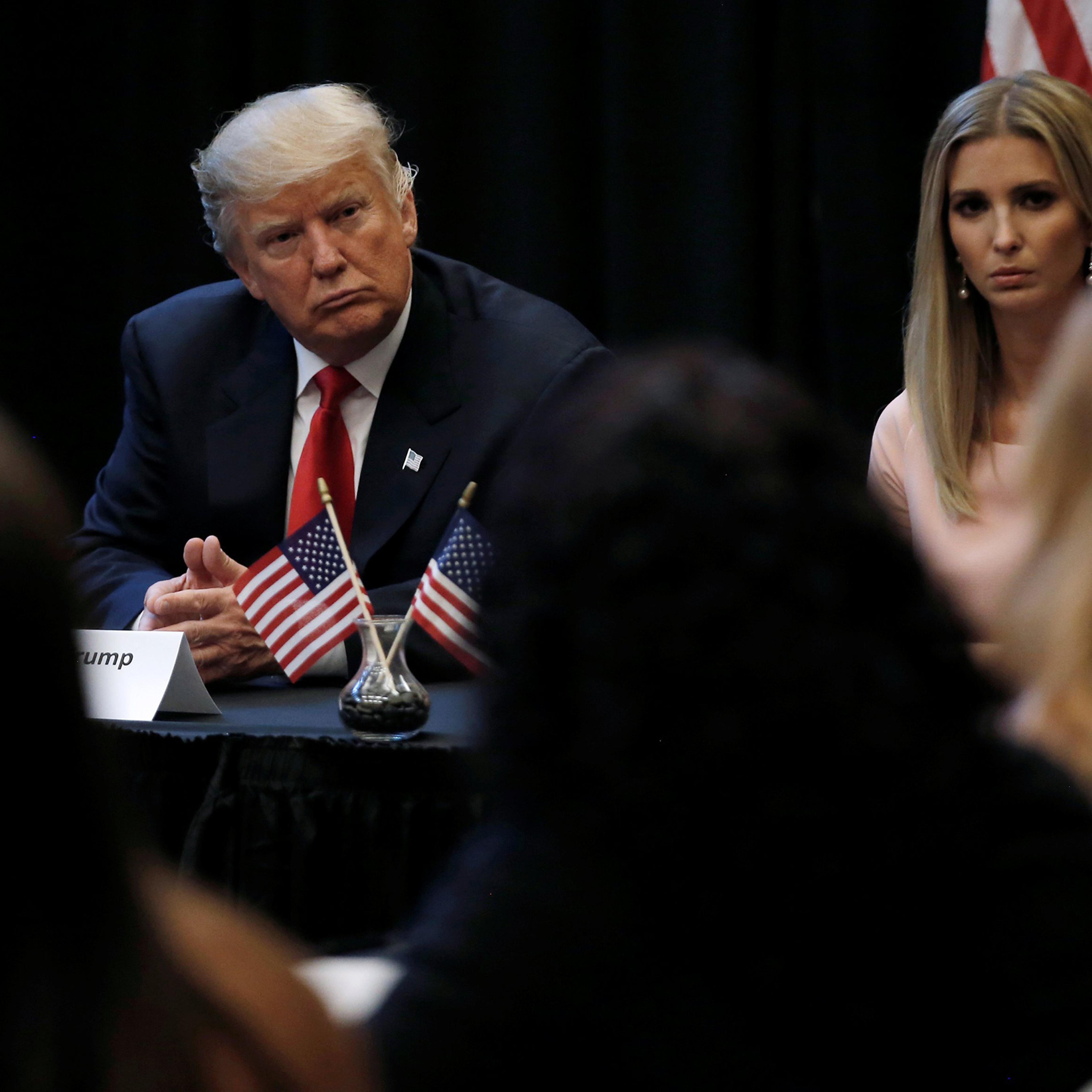 Donald Trump and his daughter Ivanka sit together as they meet with the spouses of active U.S. military members during a campaign stop in Virginia Beach, Virginia, Sept. 6, 2016.