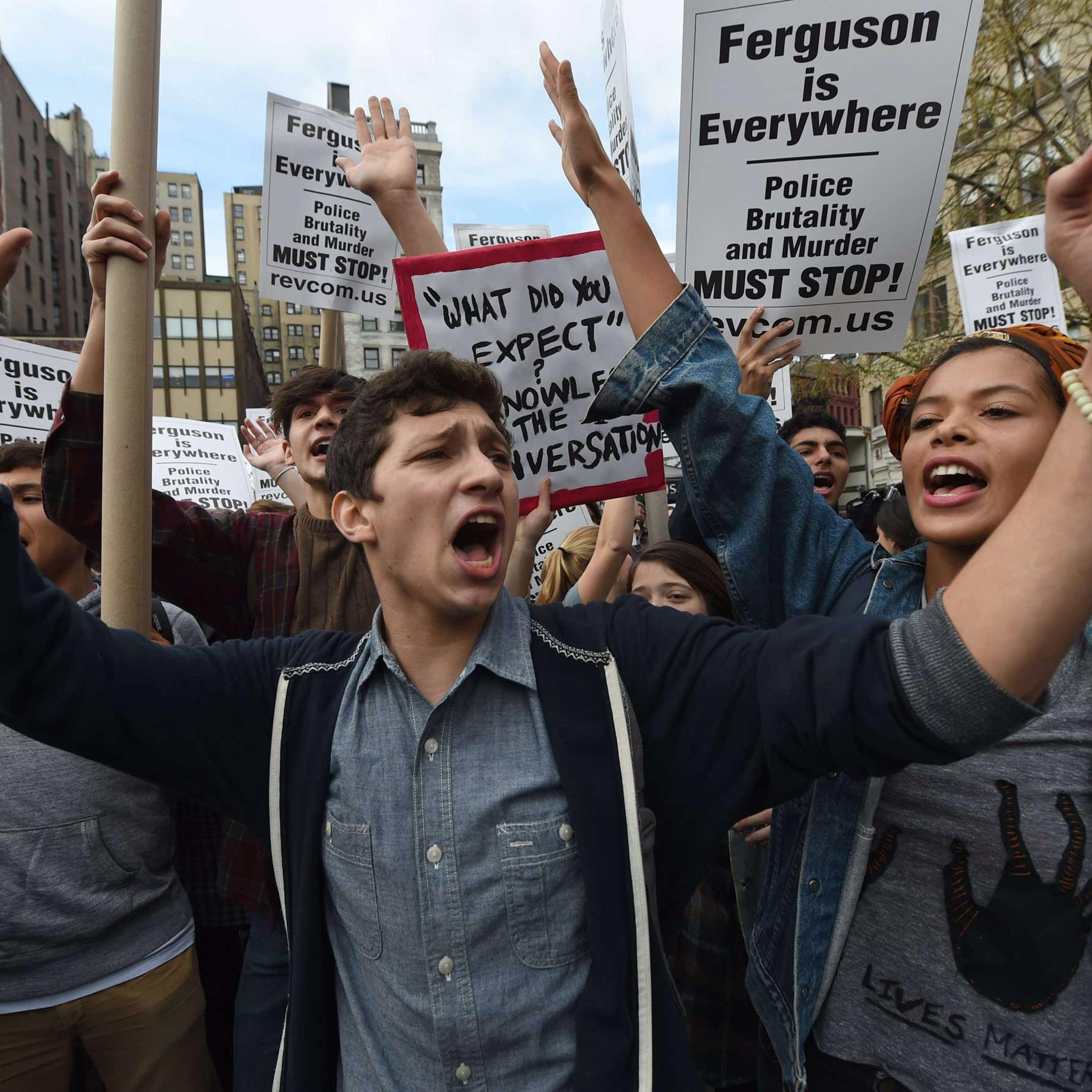 US-CRIME-POLICE-RACISM-HANDS UP