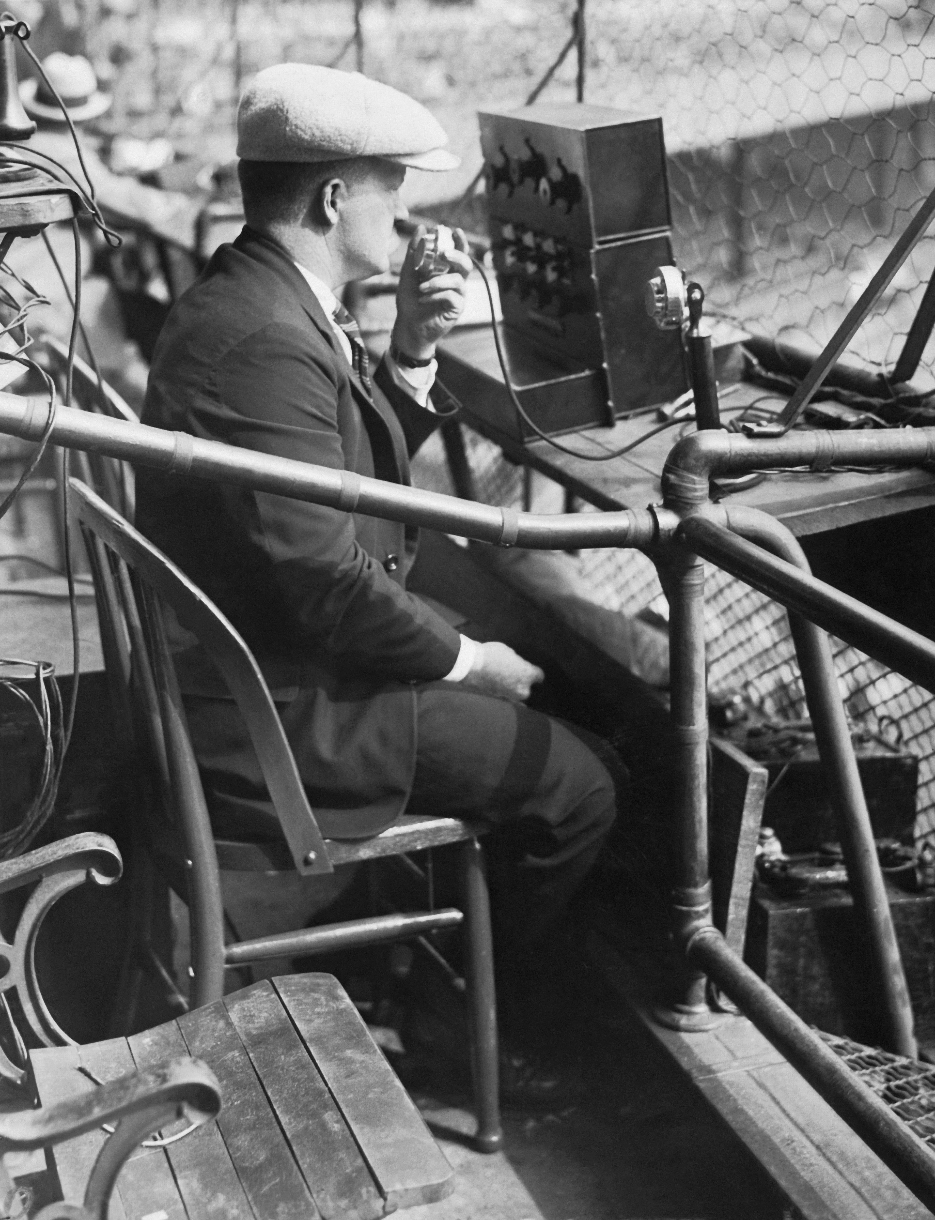 An AT&T engineer tests out an equipment for broadcasting the third game of the 1924 World Series at the Polo Grounds in New York City on Oct. 6, 1924.
