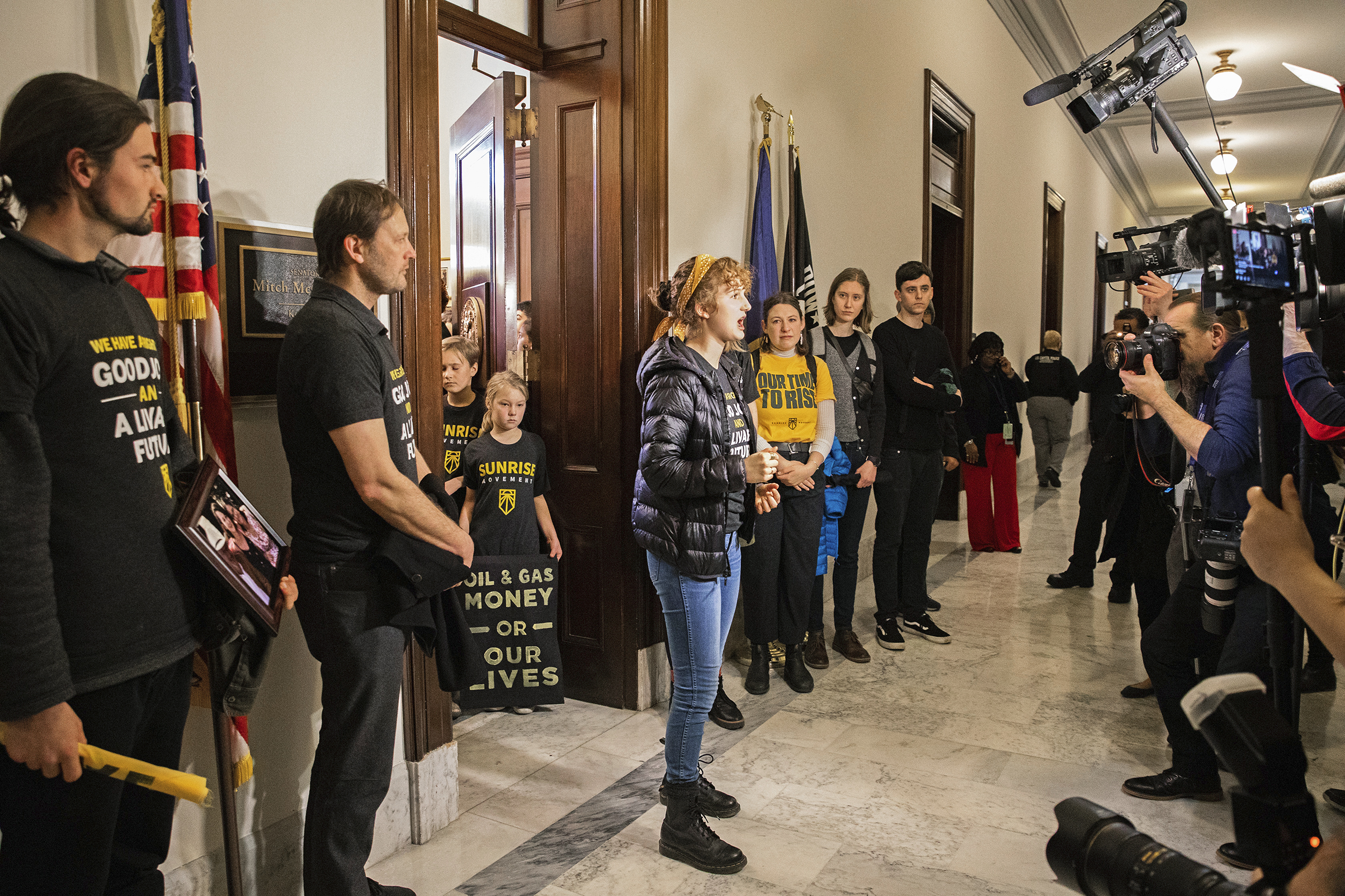 Sunrise Movement activists call for a Green New Deal on Capitol Hill