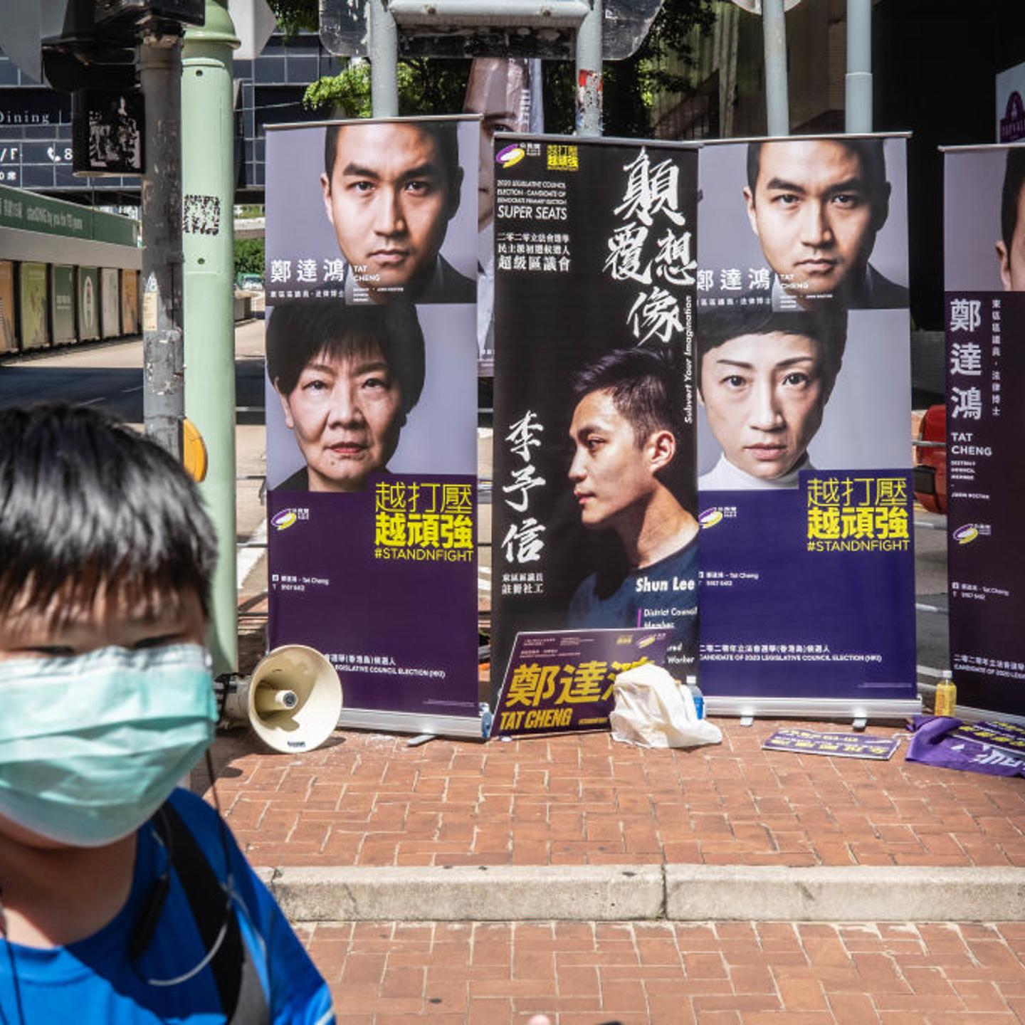 View of posters of pan-democratic candidates.In