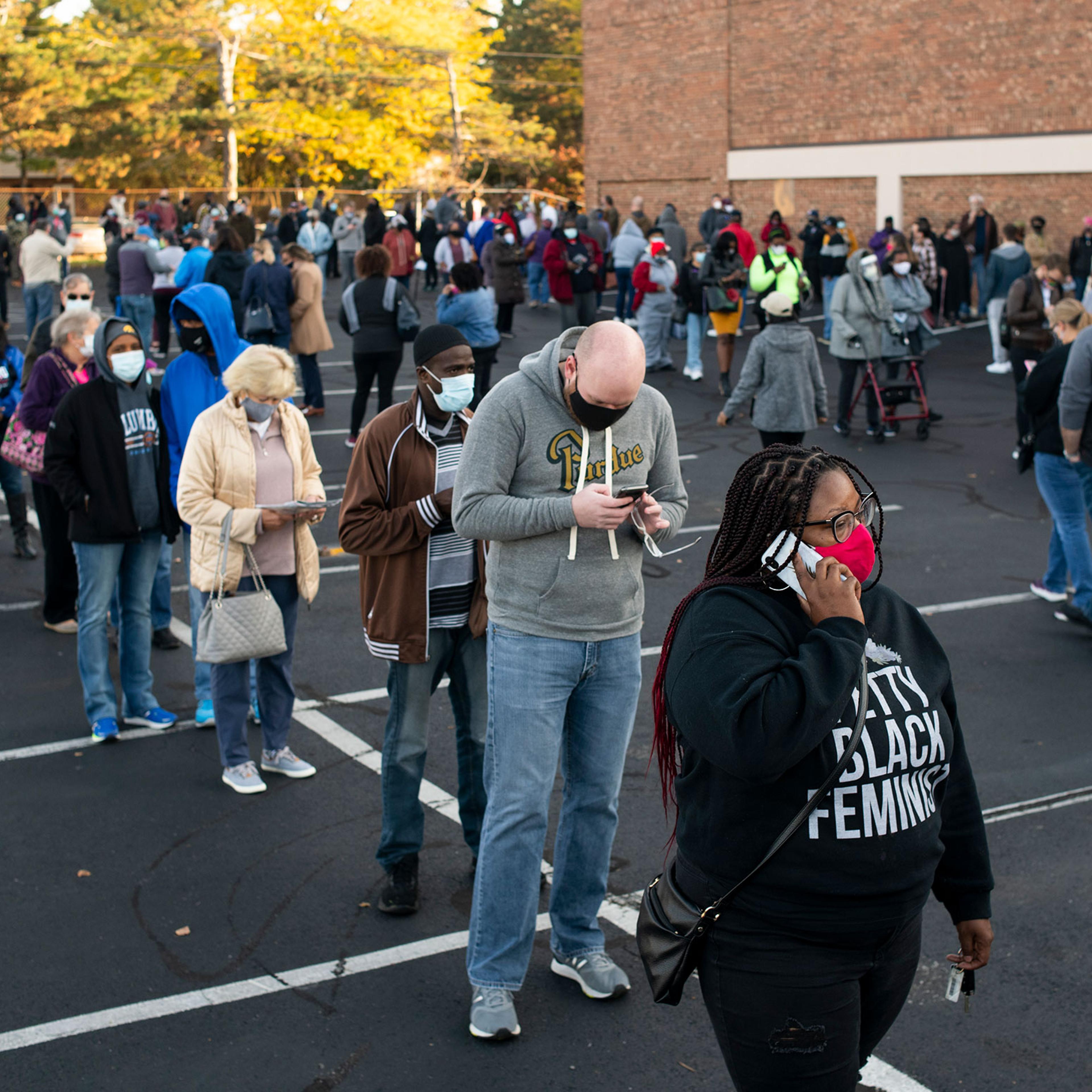 Early voters line up outside of the Franklin County Board of Elections Office on in Columbus, Ohio on Oct. 6, 2020.