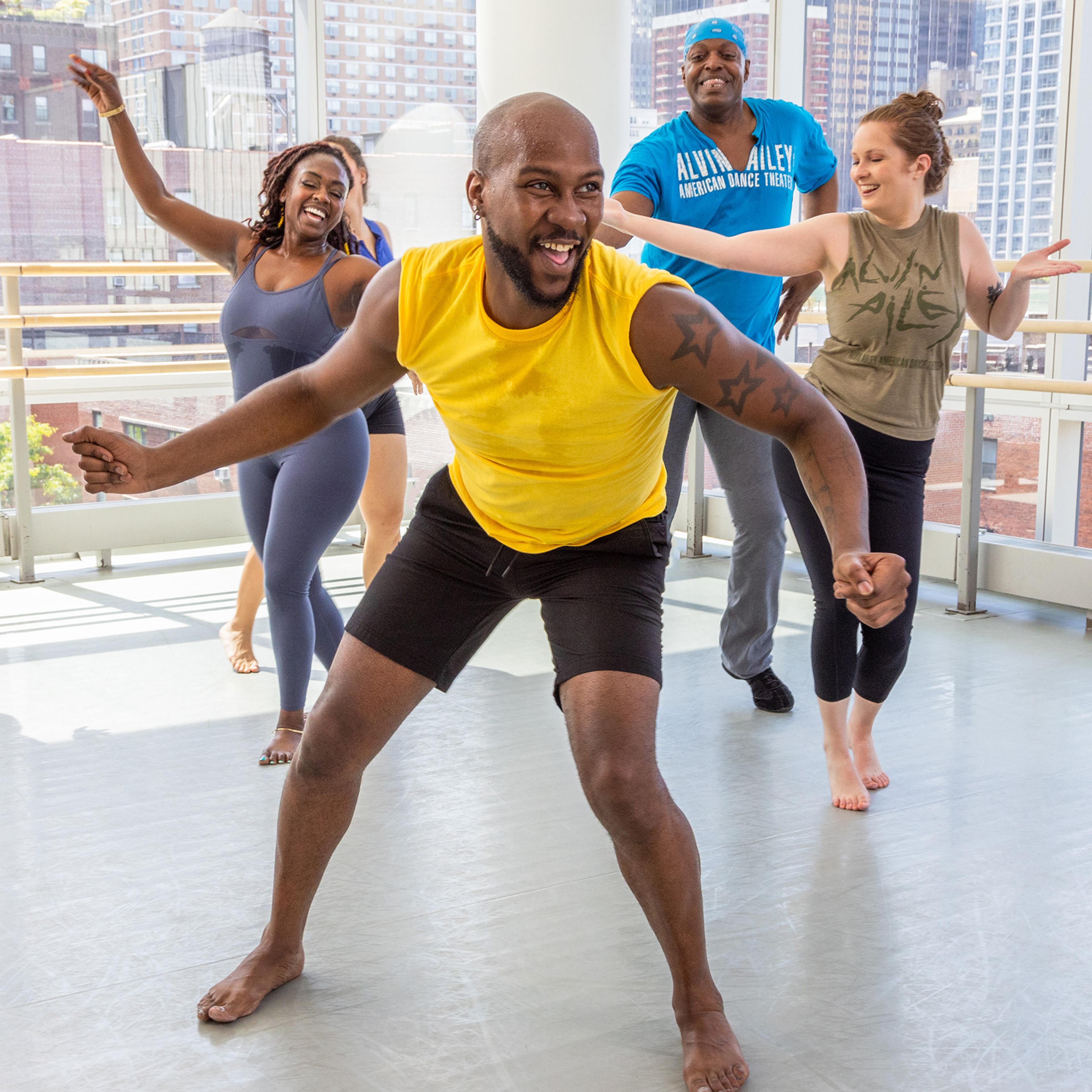 O'Shae Sibley, center, participates in an Ailey Extension dance class.