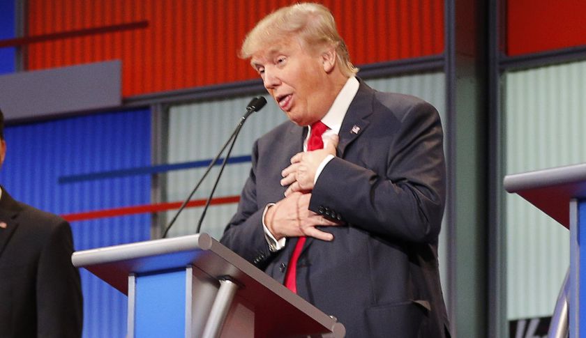 Republican 2016 U.S. presidential candidate and businessman Donald Trump reacts near the end of the first official Republican presidential candidates debate of the 2016 U.S. presidential campaign in Cleveland