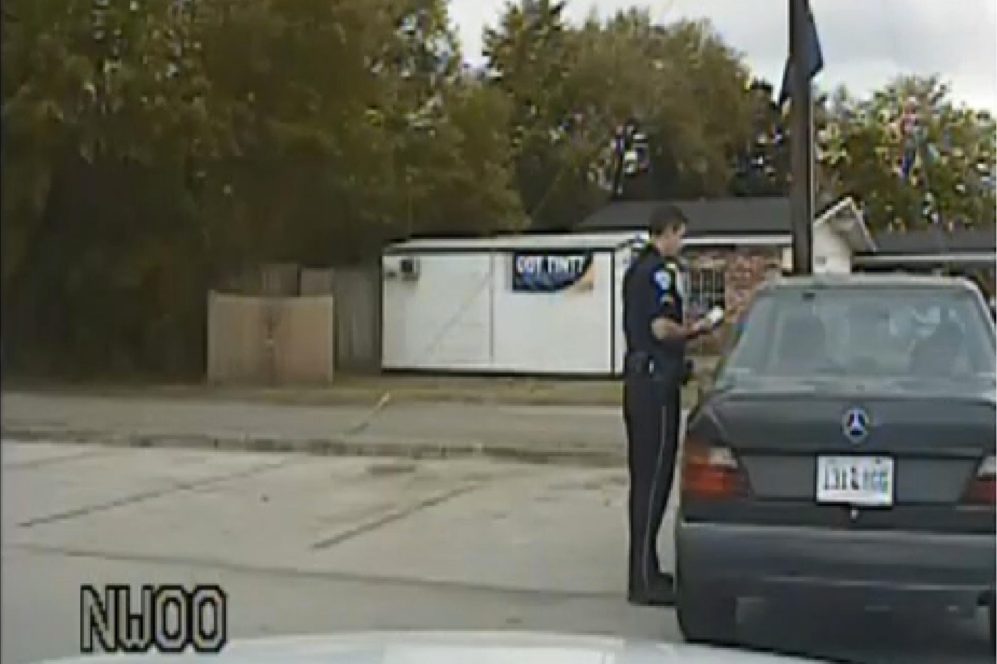 Officer Michael Slager reviews Walter Scott's Drivers License in North Charleston, S.C. on April 4, 2015.