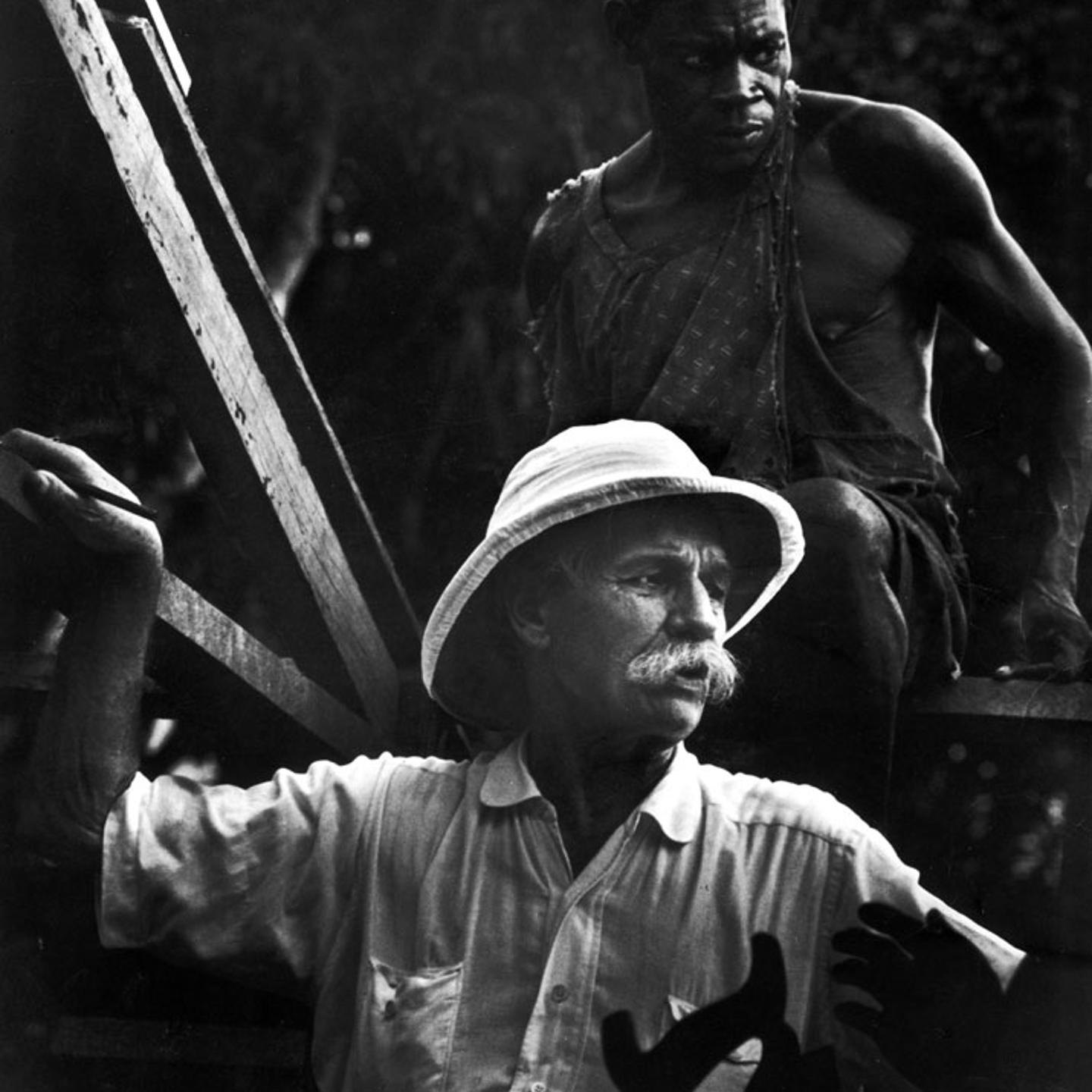 Albert Schweitzer supervises the building of a hospital in Gabon, West Africa, 1952.