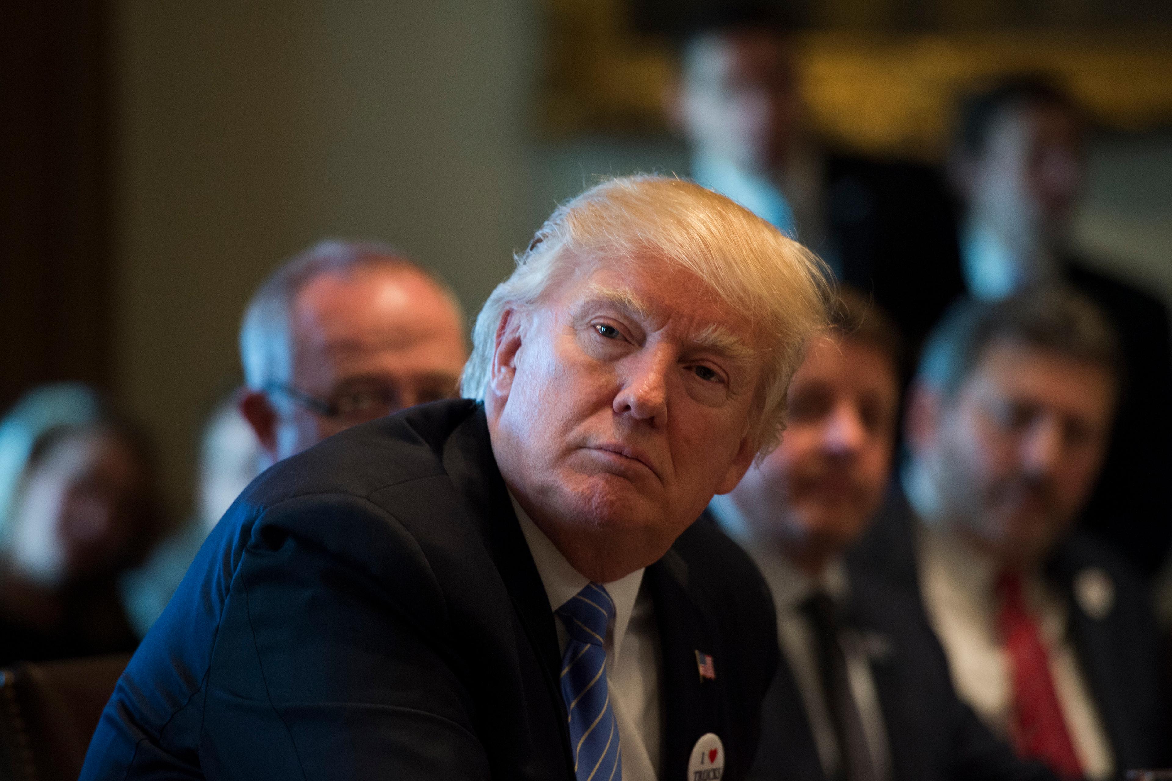 President Donald Trump holds a listening session on health care with truckers and CEOs from the American Trucking Associations in the Cabinet Room at the White House on March 23, 2017 in Washington, D.C.