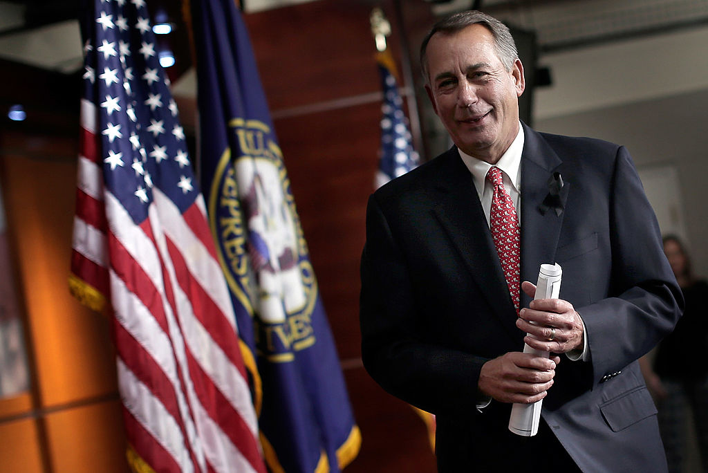 John Boehner departs a press conference Dec. 12, 2013 in Washington, DC.