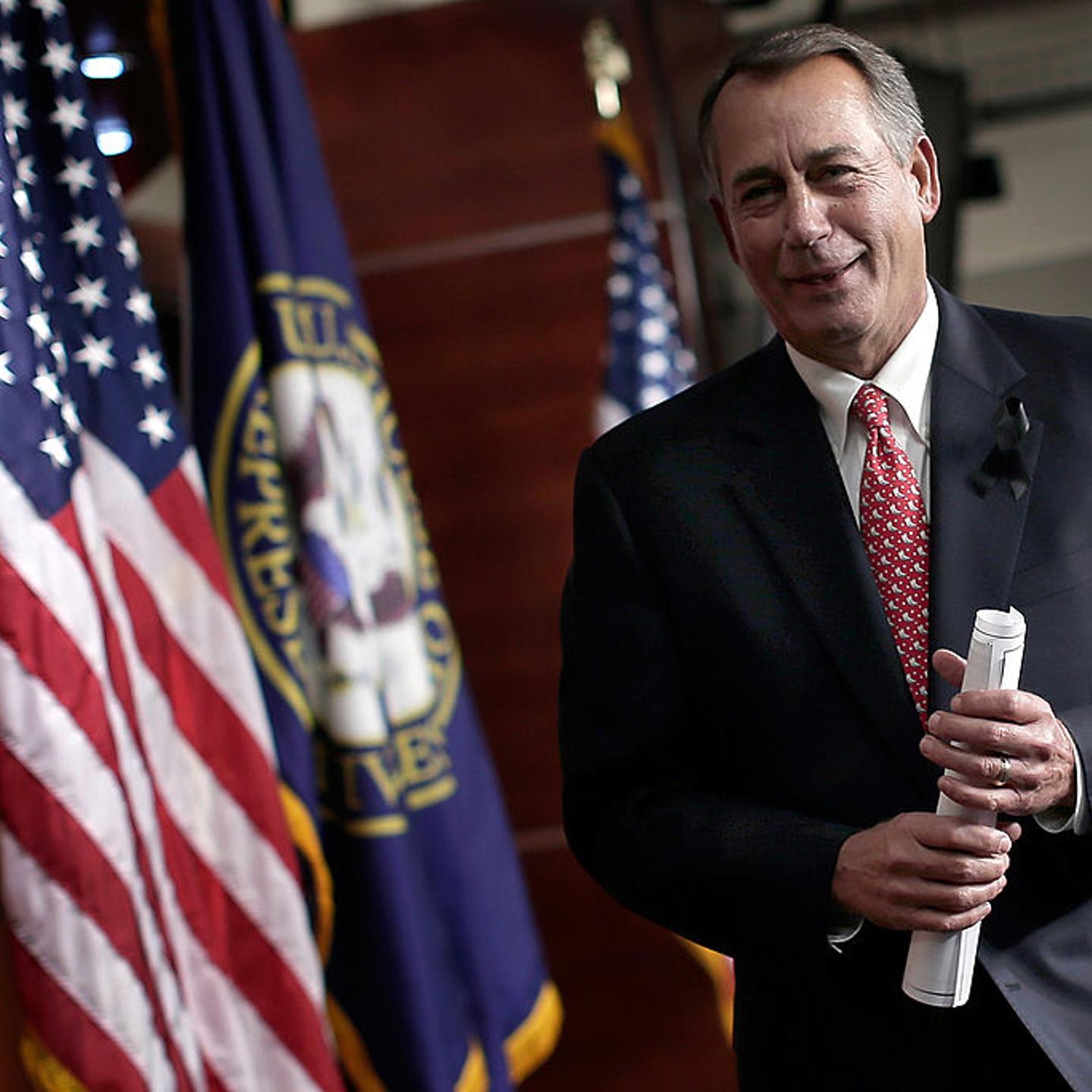John Boehner departs a press conference Dec. 12, 2013 in Washington, DC.