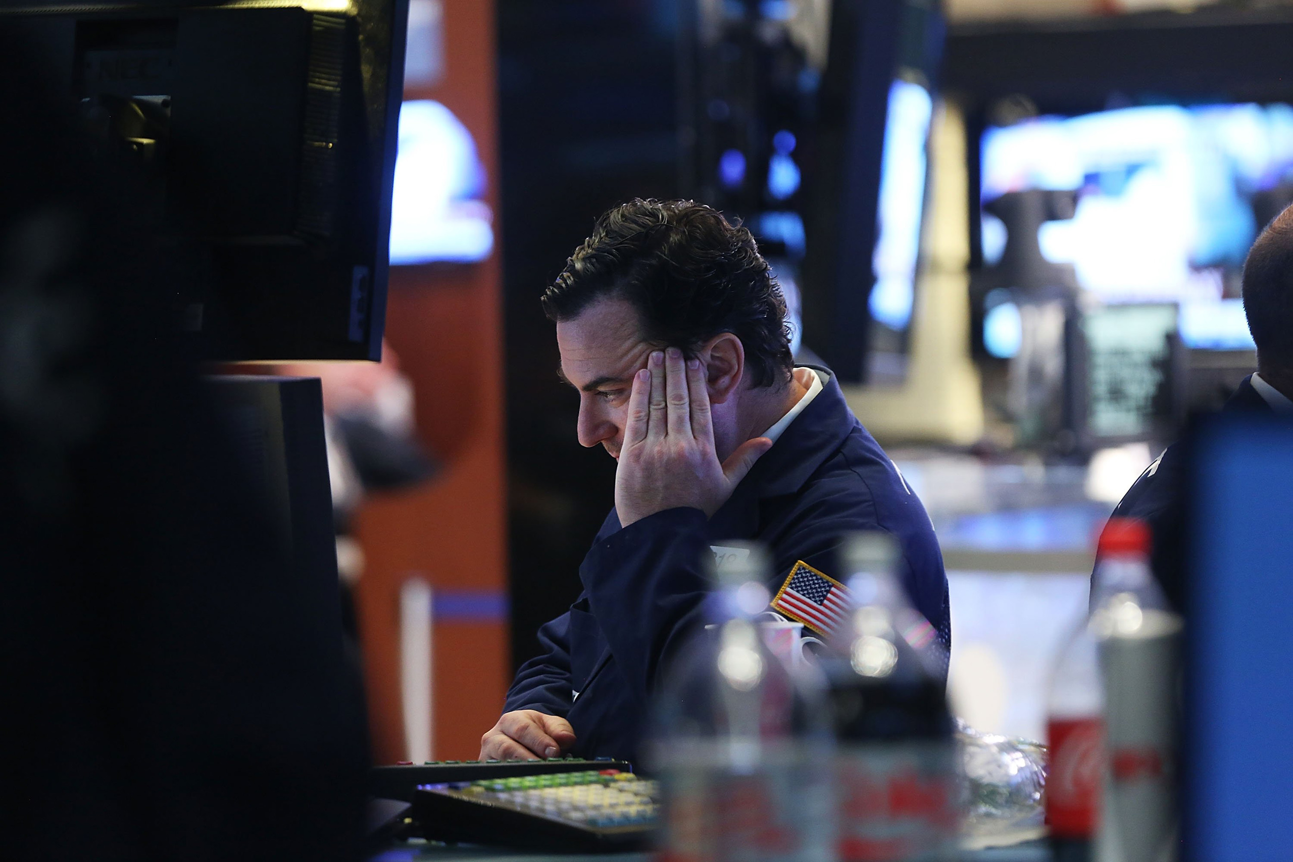 Traders work on the floor of the New York Stock Exchange (NYSE) at the close of the trading day in New York City on June 28, 2016.
