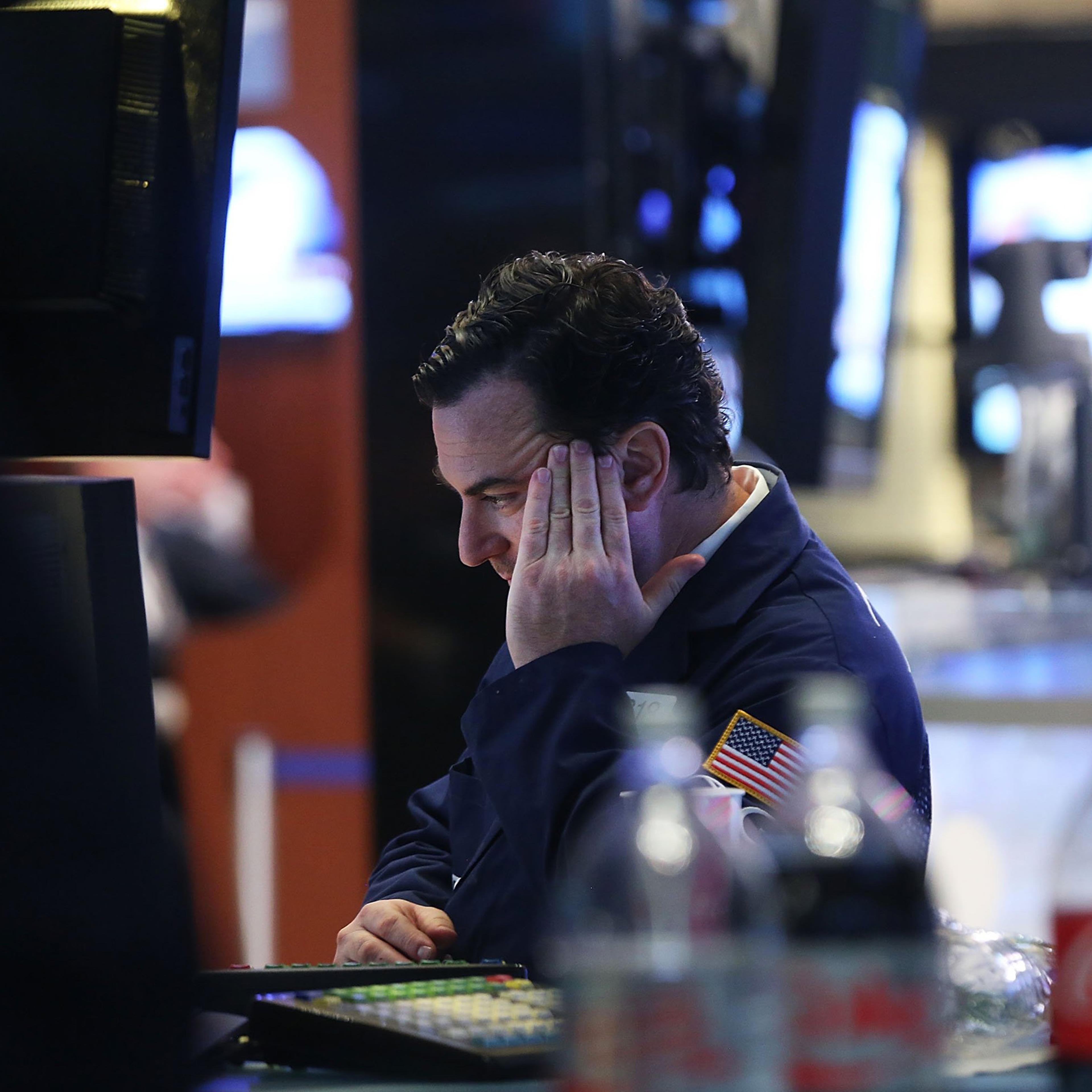 Traders work on the floor of the New York Stock Exchange (NYSE) at the close of the trading day in New York City on June 28, 2016.