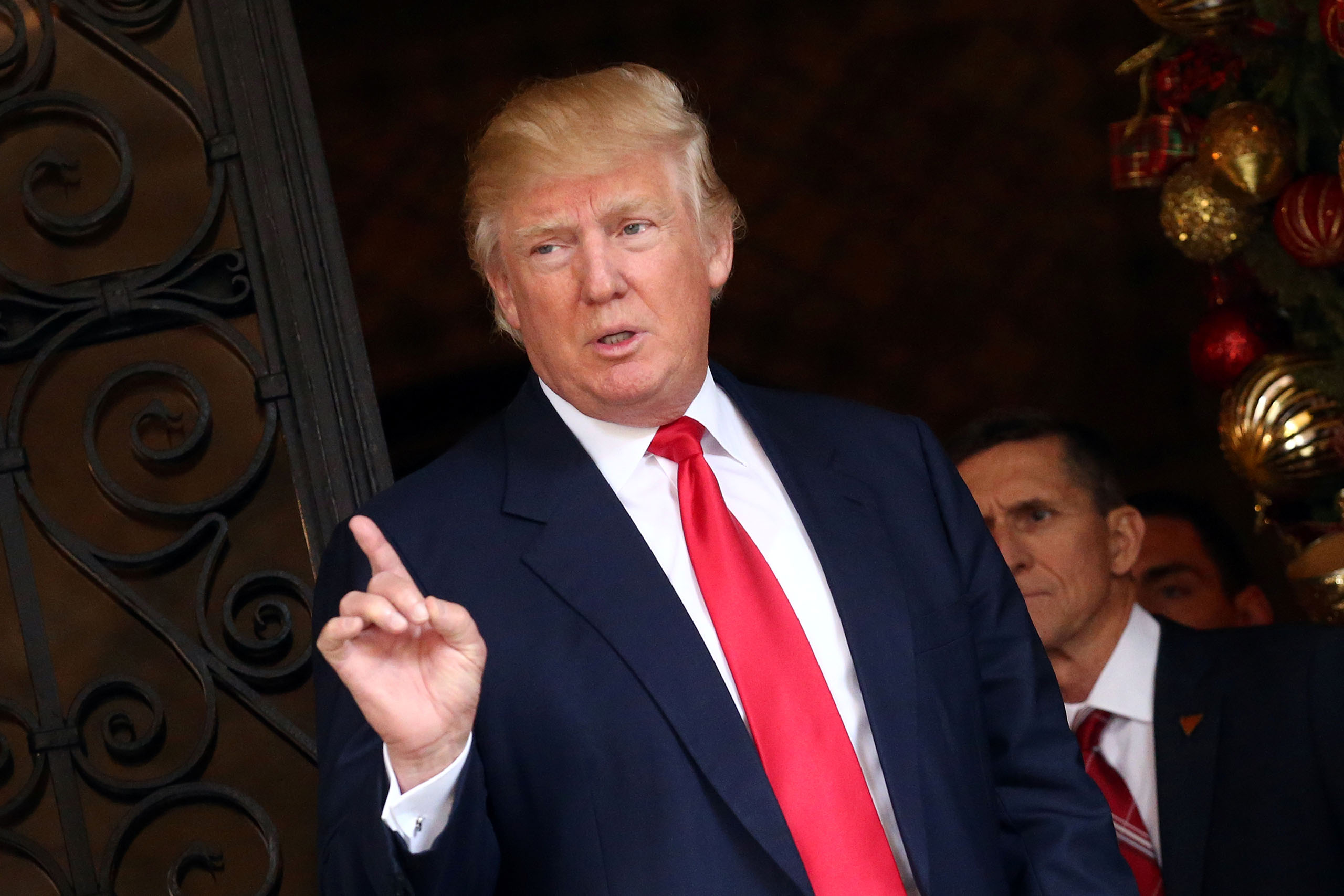 U.S. President-elect Donald Trump talks to members of the media at Mar-a-Lago estate in Palm Beach, Florida