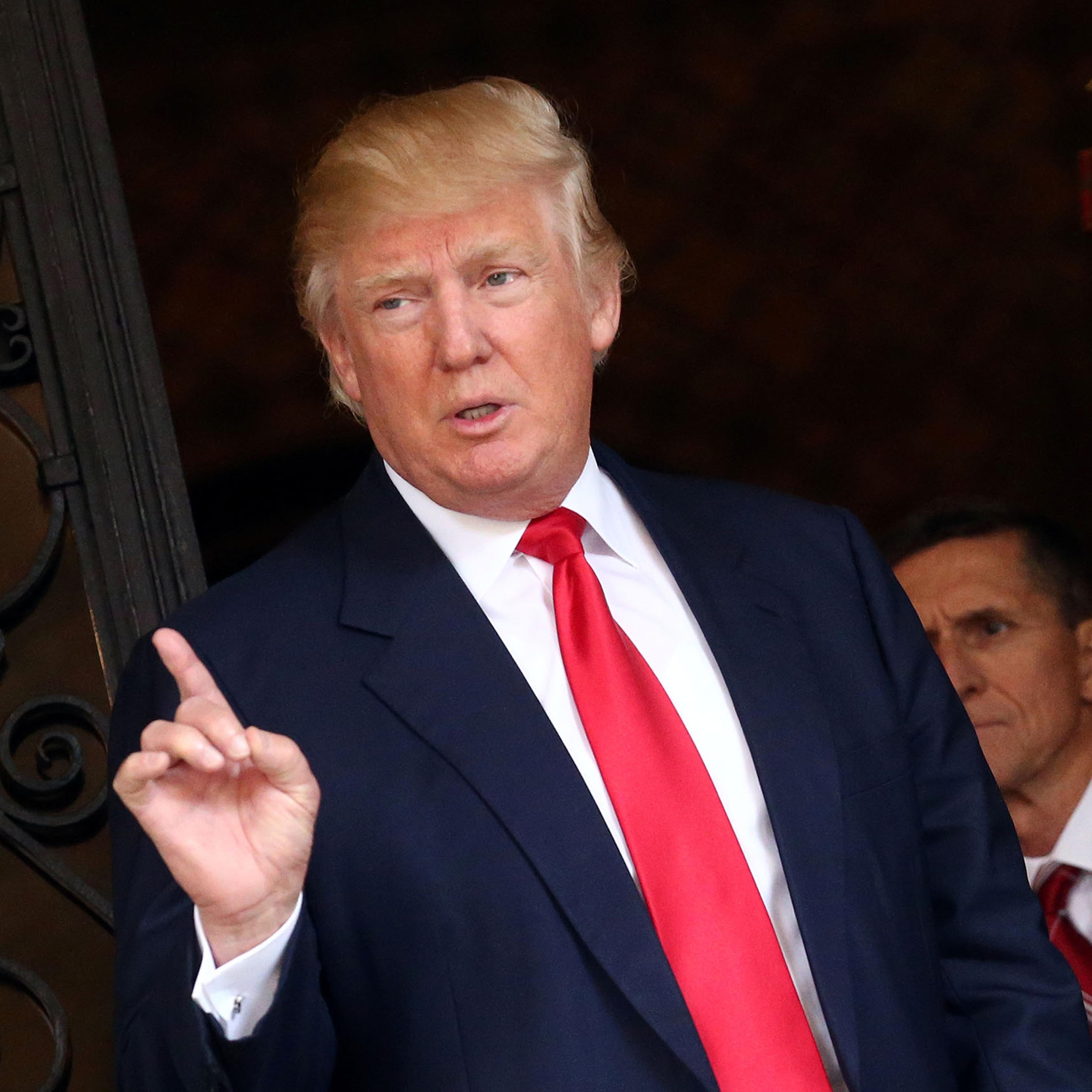 U.S. President-elect Donald Trump talks to members of the media at Mar-a-Lago estate in Palm Beach, Florida