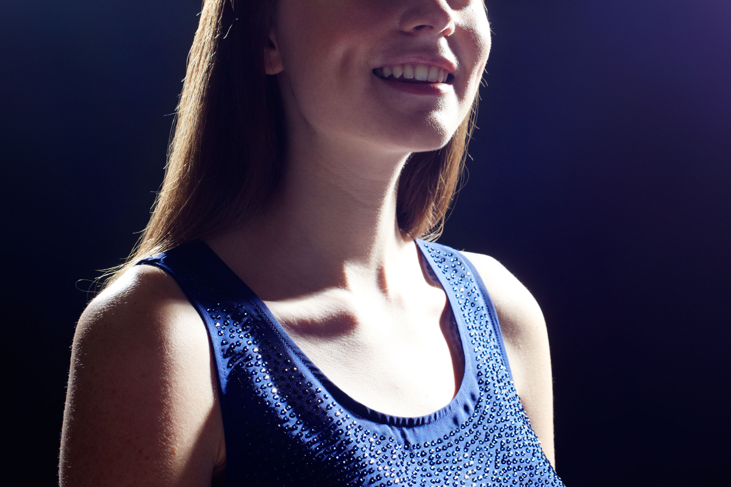 Young woman looking up.