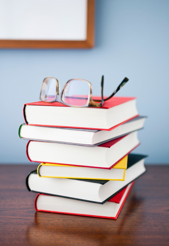 books-stacked-table