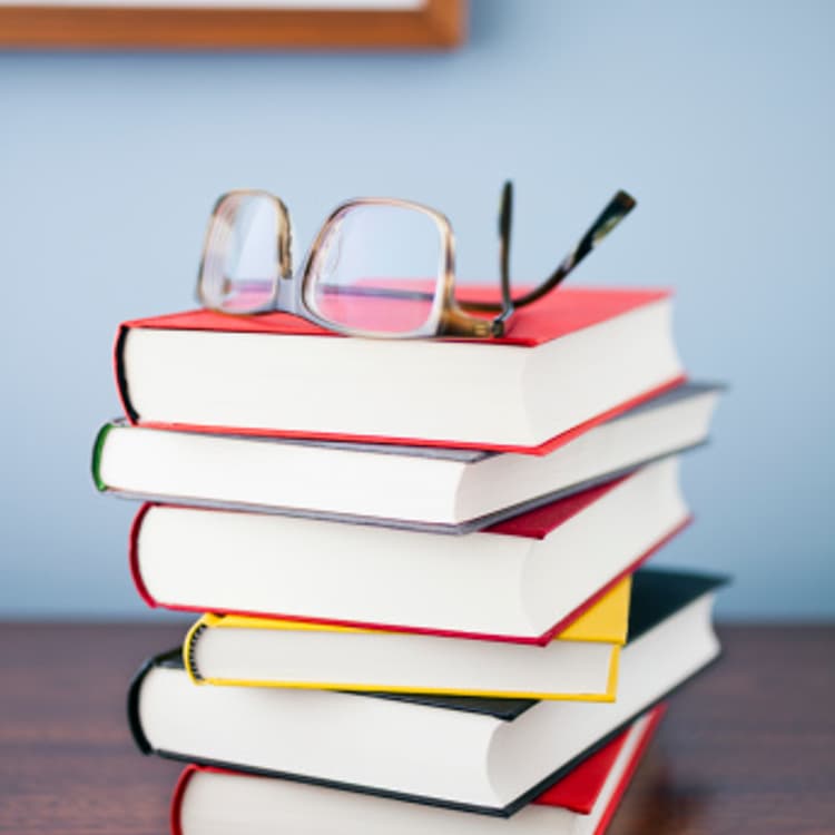 books-stacked-table