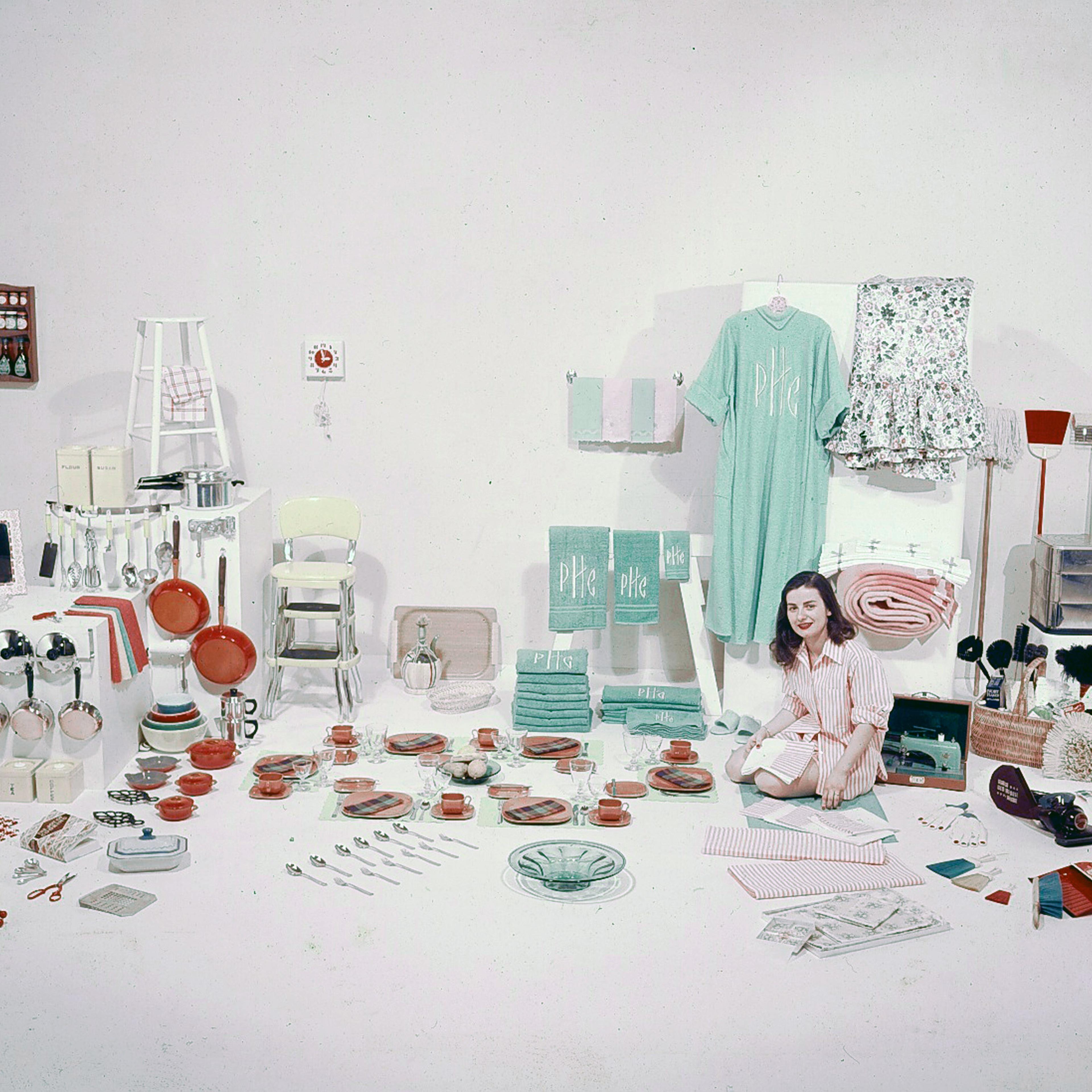 Bride's four showers. With this practical haul Peggy Cross is set to keep house.
