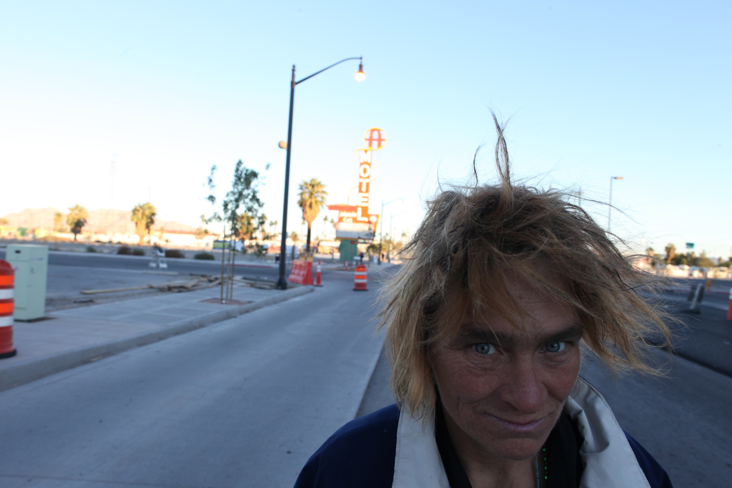 In November 2010, photographer Brenda Ann Kenneally spent 10 days in Las Vegas shooting the Western Hotel, which closed its doors this month. <br><br>A passerby near The Western makes her way down Freemont Street.
