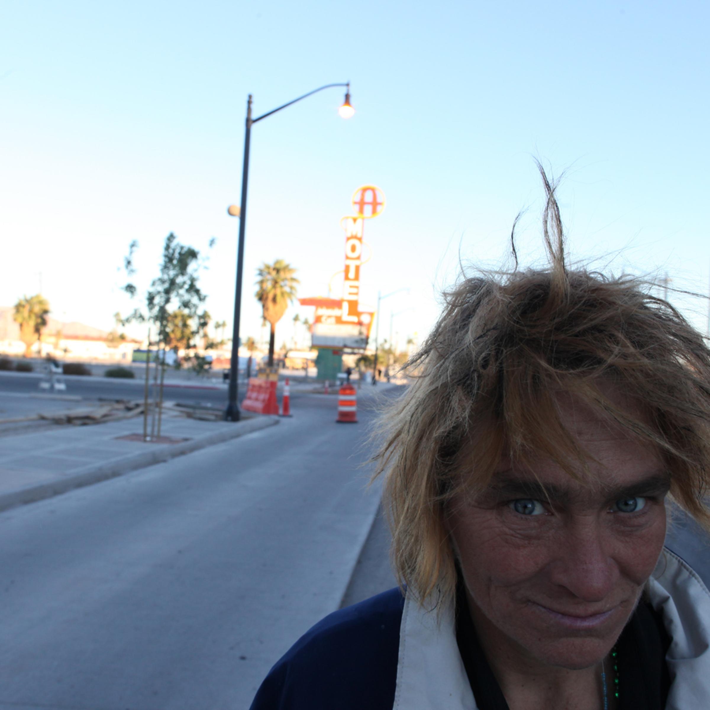 In November 2010, photographer Brenda Ann Kenneally spent 10 days in Las Vegas shooting the Western Hotel, which closed its doors this month. <br><br>A passerby near The Western makes her way down Freemont Street.
