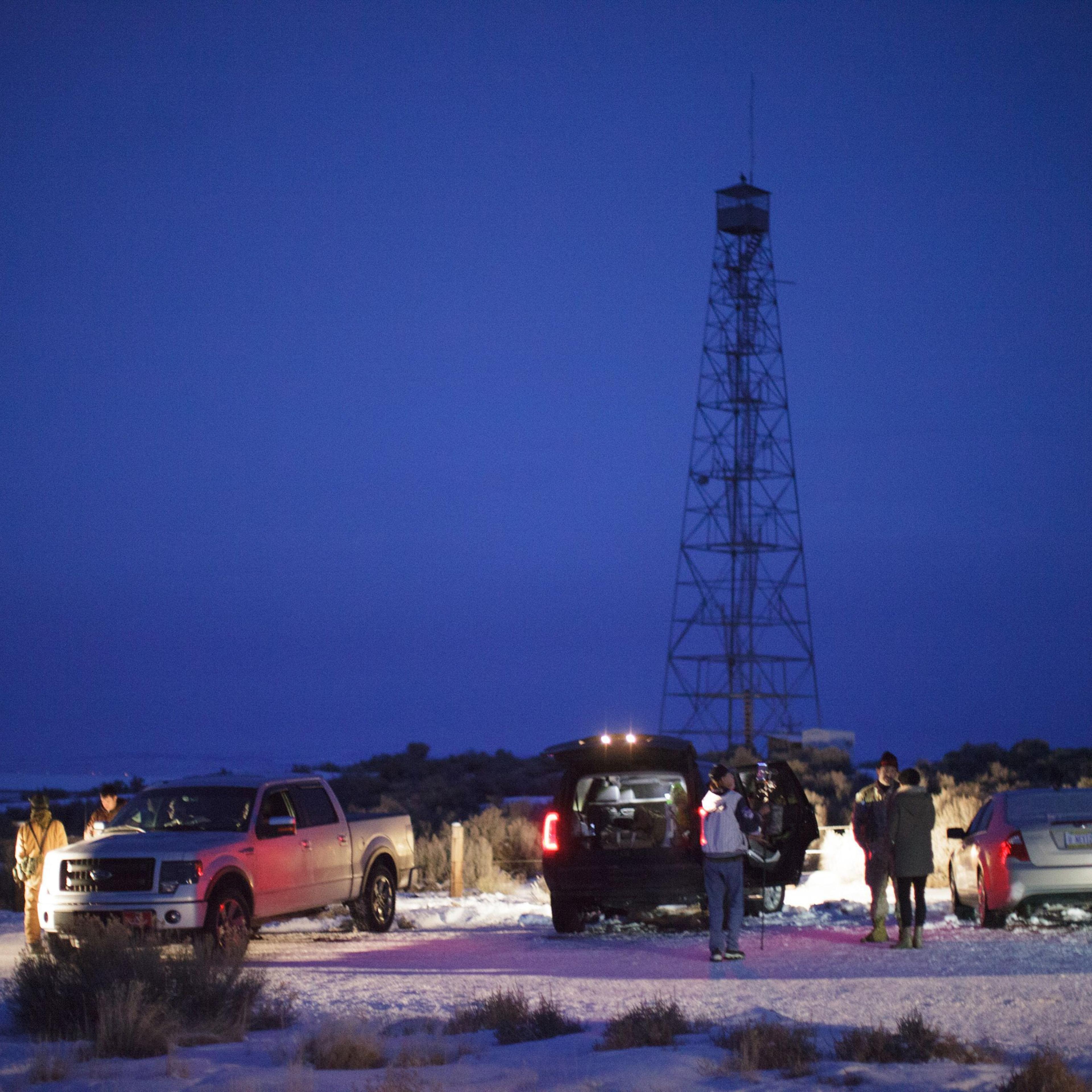 Members of a small militia at the entrance to the Malheur Wildlife Refuge Headquarters property some 30 miles from Burns, Ore., Jan. 3, 2016.