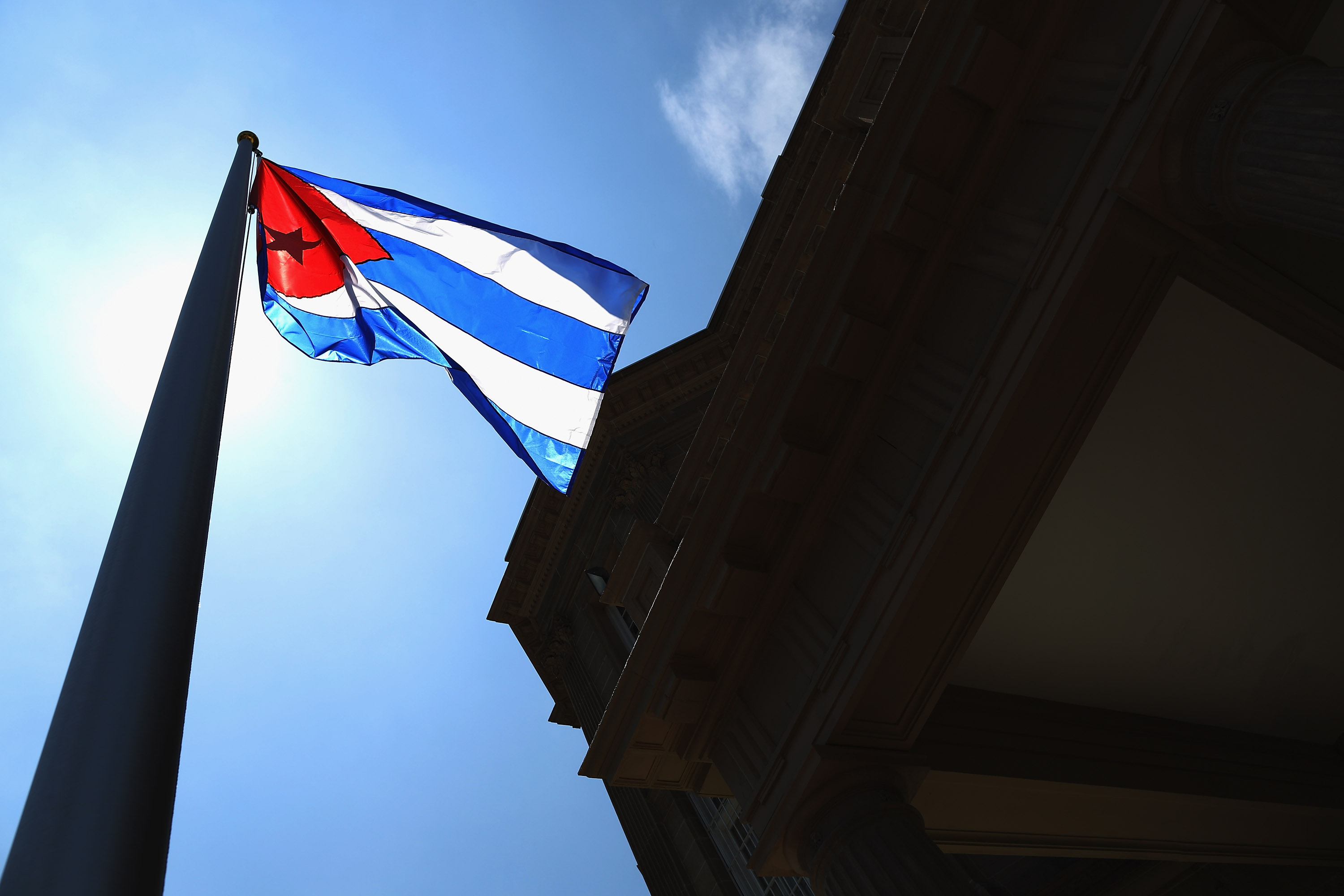The Cuban flag flies in front of the country's embassy for the first time in 54 years in Washington, DC. on July 20, 2015.