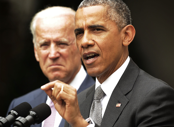 U.S. President Barack Obama (R), flanked by Vice President Joe Biden (L), gives a statement on the Supreme Court health care decision in the Rose Garden at the White House on June 25, 2015 in Washington, DC.