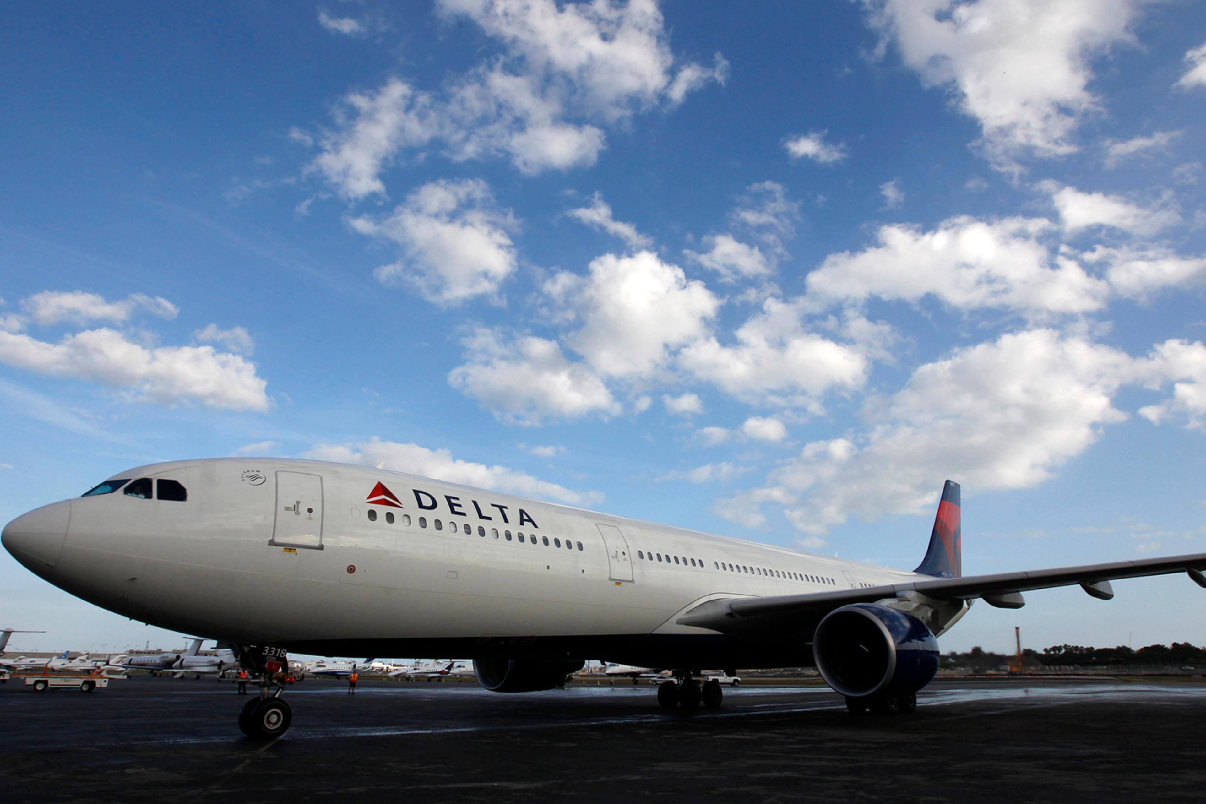 The Delta Airlines Charter carrying the University of Notre Dame Fighting Irish NCAA college football team arrives at the Ft. Lauderdale-Hollywood International Airport for the 2013 Discover BCS National Championship game in Ft. Lauderdale