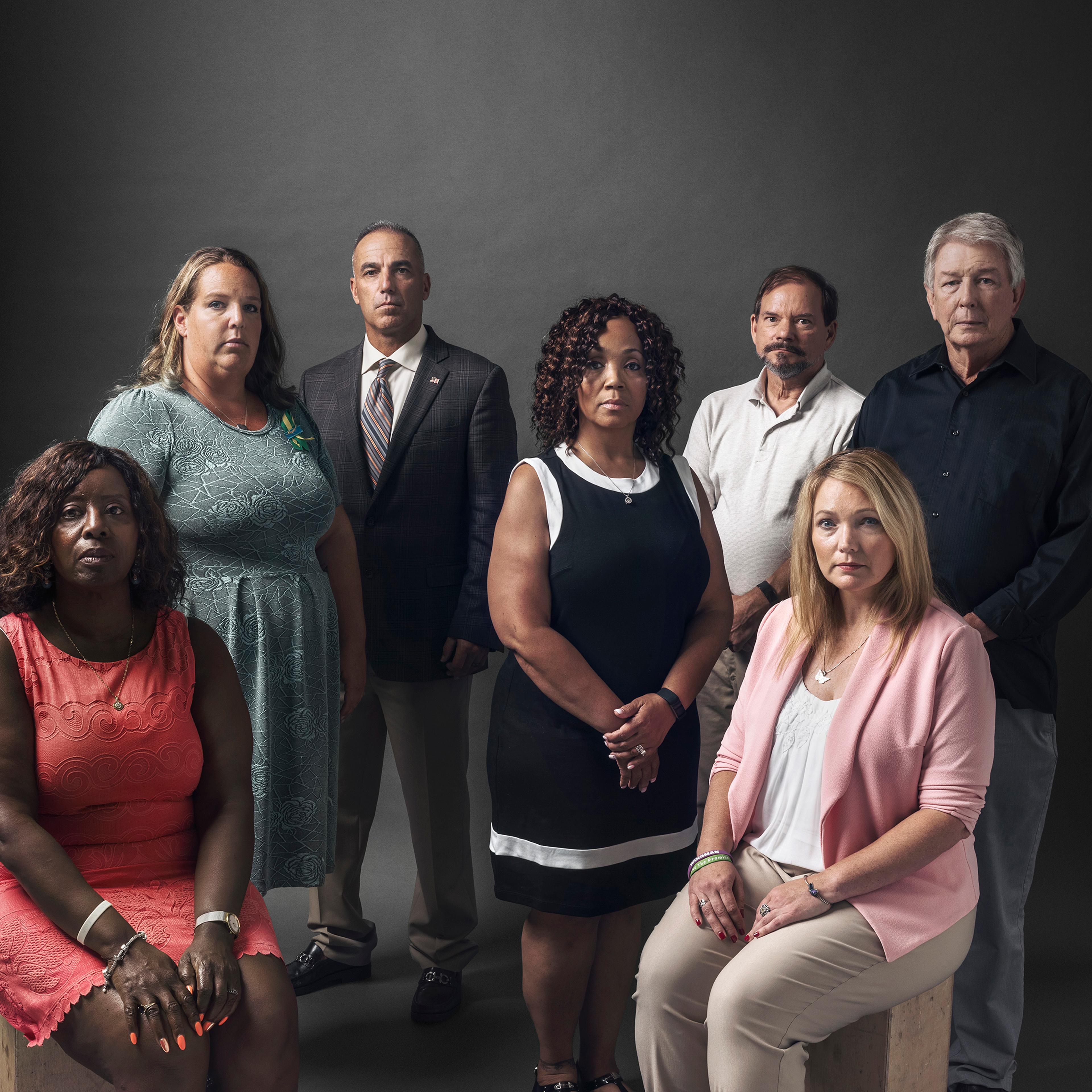 Seven parents of seven dead students. From left: Pamela Wright- Young, Melissa Willey, Andrew Pollack, Darshell Scott, Tom Mauser, Nicole Hockley and Darrell Scott