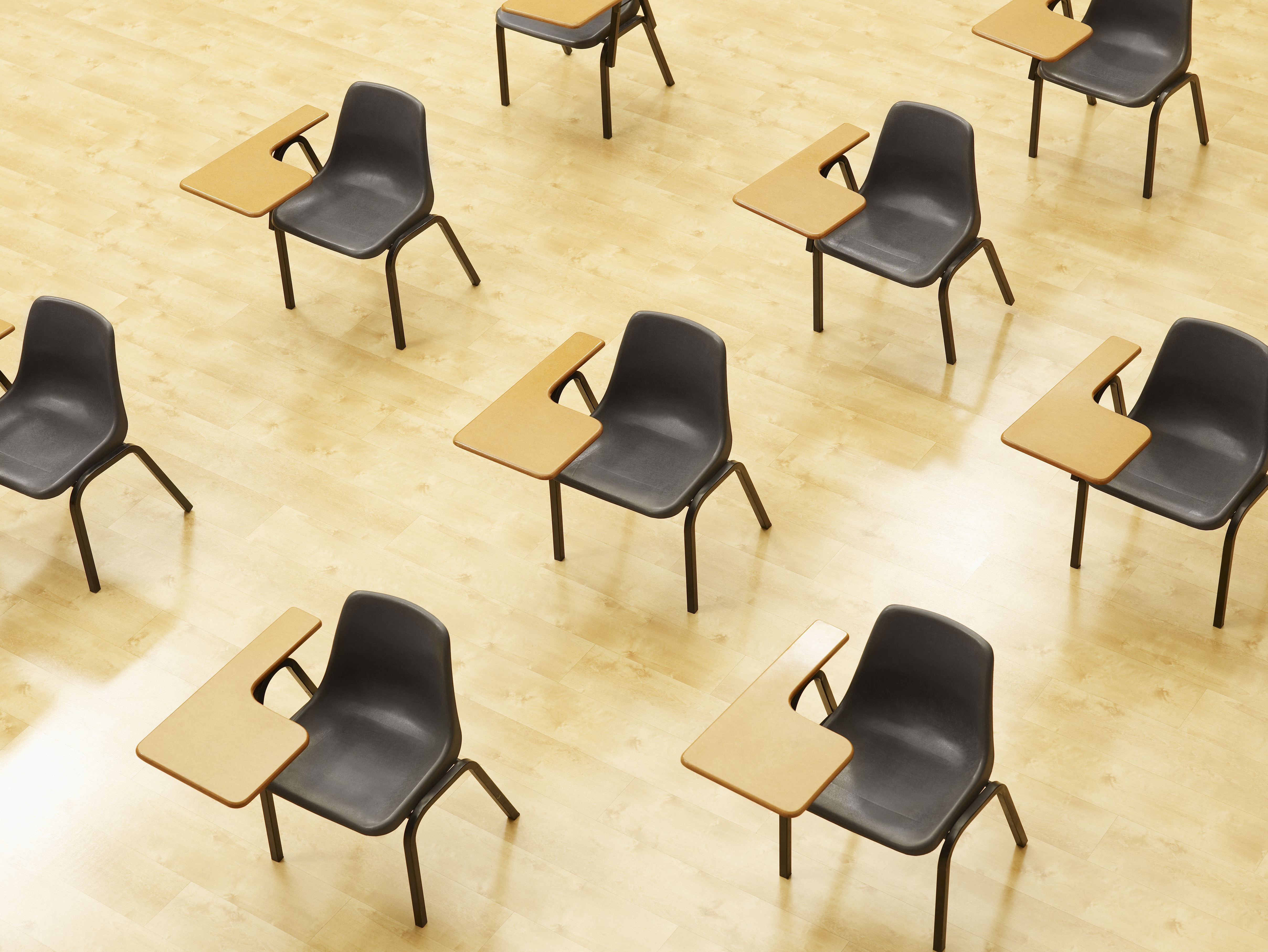 Desks in empty classroom