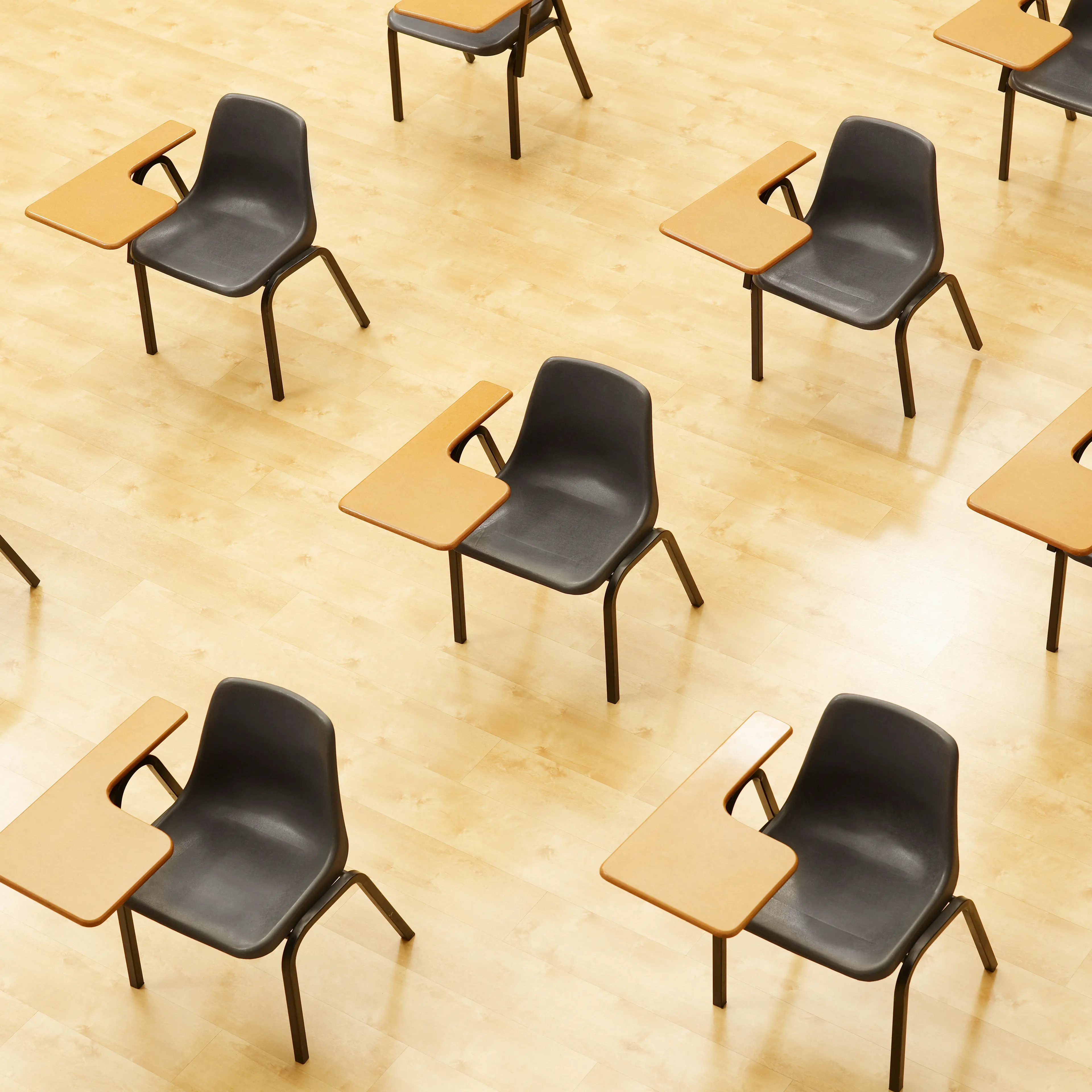Desks in empty classroom