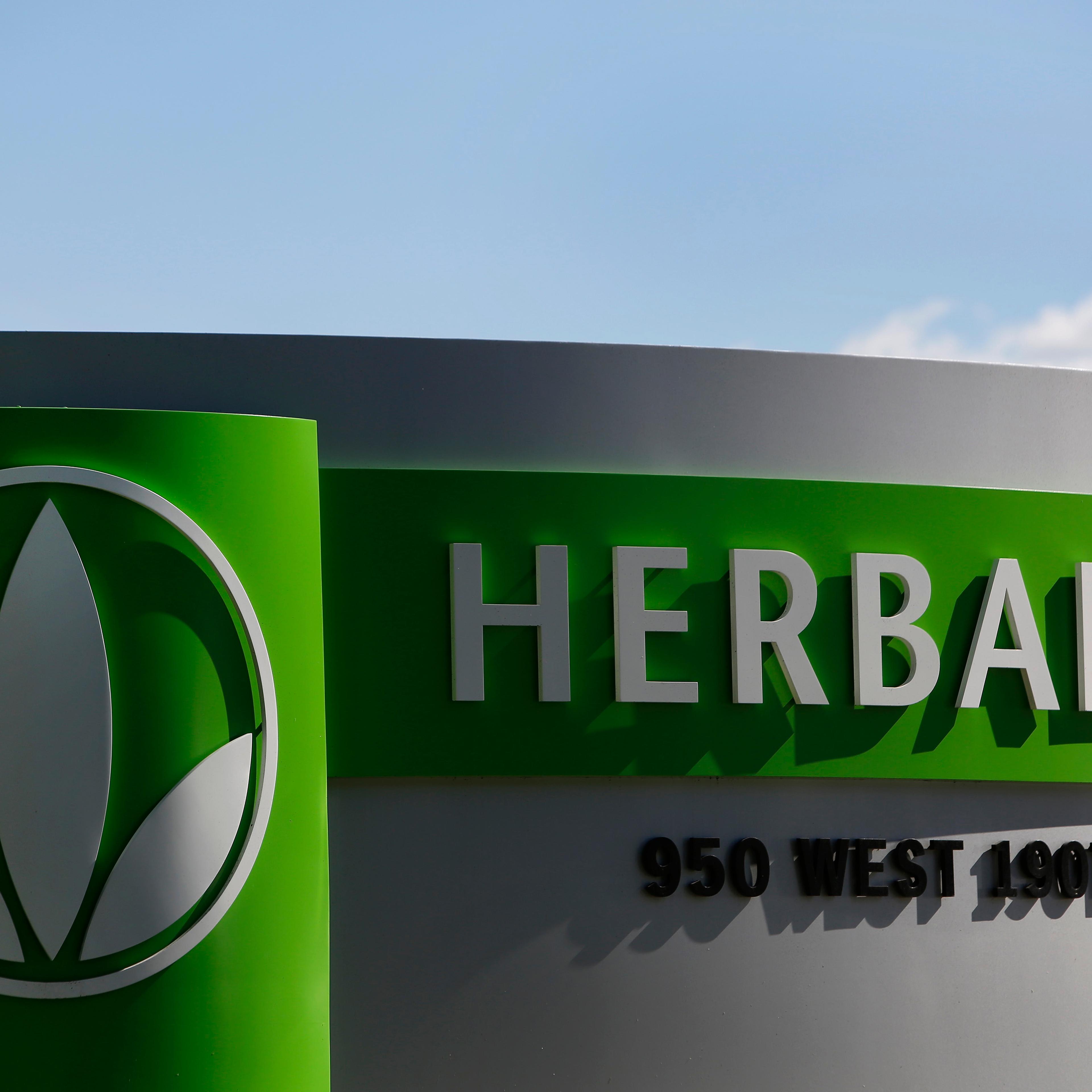Herbalife Ltd. signage is displayed outside of Herbalife Plaza in Torrance, Calif. on Feb. 3, 2014.