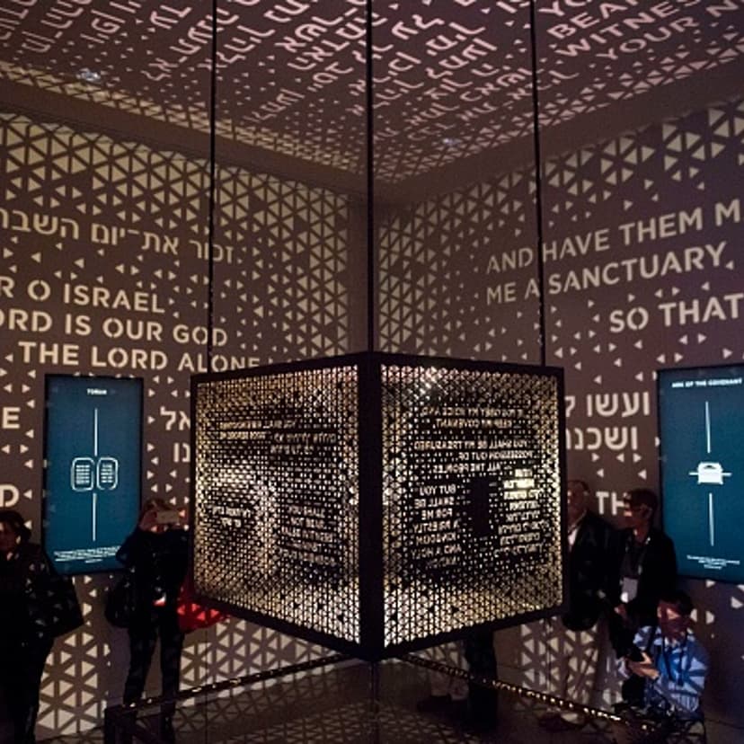 Visitors walk through the Ark of the Covenant exhibit as part of the "Journey through the Hebrew Bible" exhibit during a media preview of the new Museum of the Bible, a museum dedicated to the history, narrative and impact of the Bible, in Washington, DC