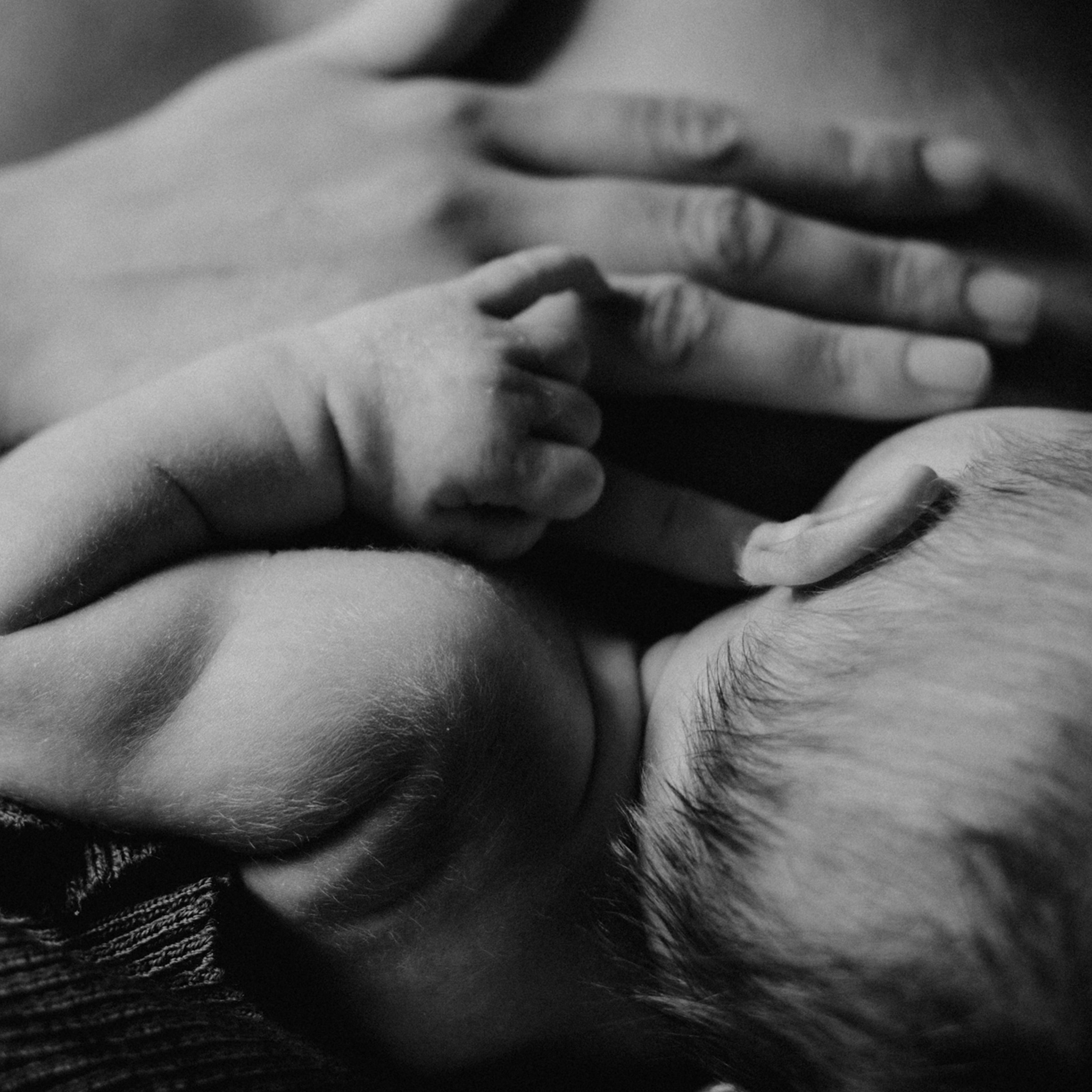Midsection Of Mother Breastfeeding Baby