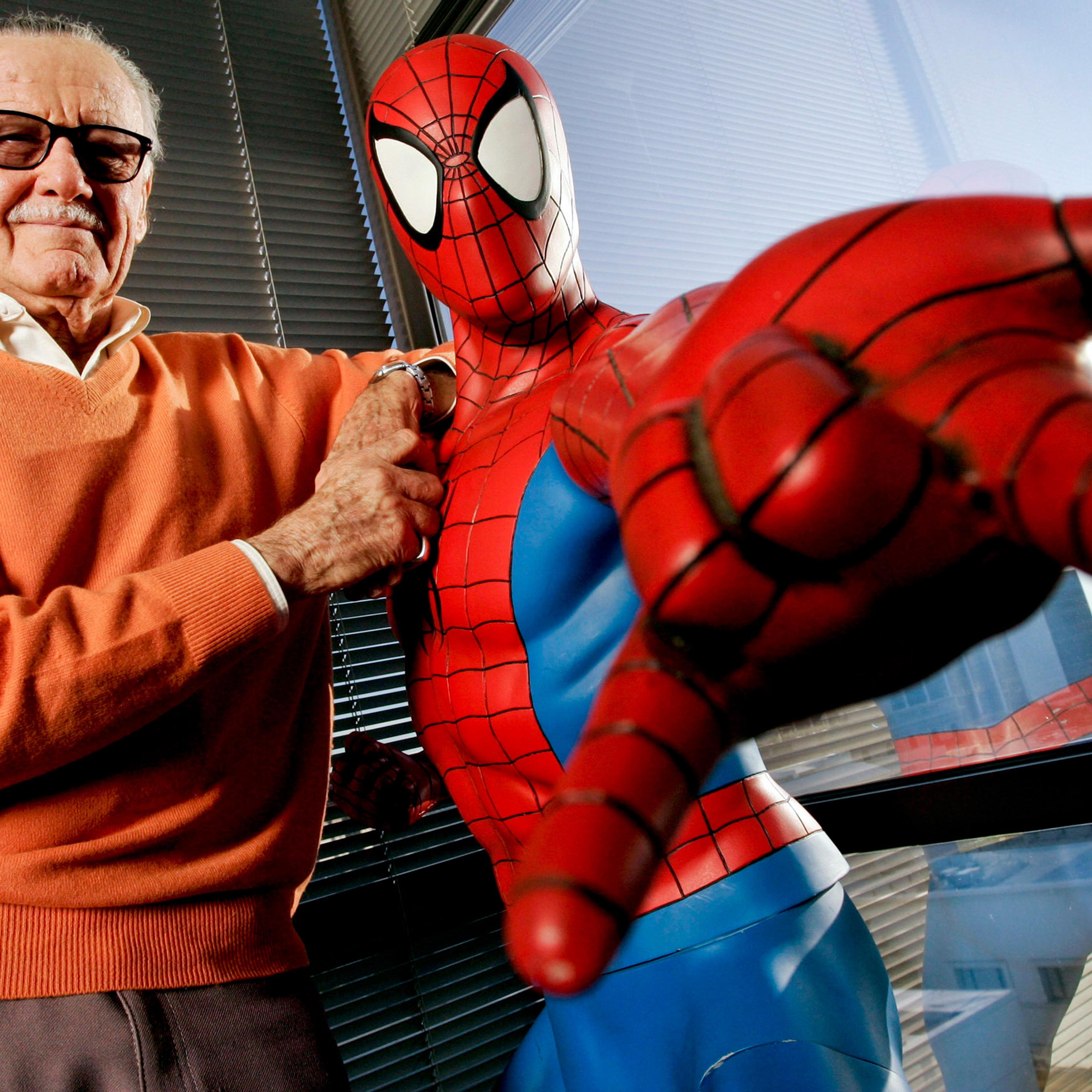 Stan Lee, founder of Marvel Entertainment Inc., poses next t