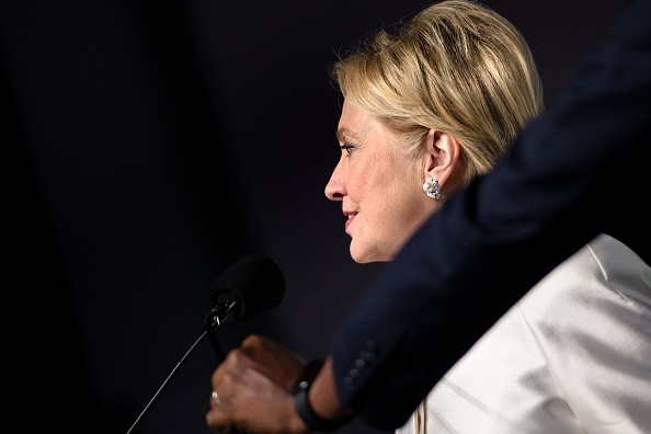 Democratic presidential nominee Hillary Clinton speaks as her microphones are adjusted during the Congressional Black Caucus Foundation's Phoenix Awards Dinner on September 17, 2016 in Washington, DC.