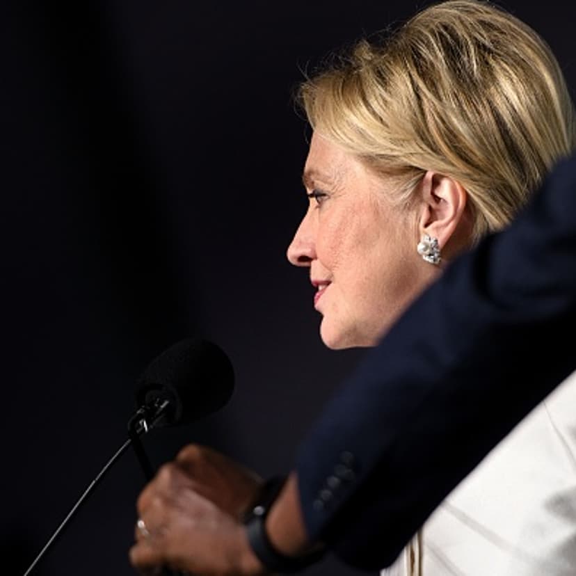 Democratic presidential nominee Hillary Clinton speaks as her microphones are adjusted during the Congressional Black Caucus Foundation's Phoenix Awards Dinner on September 17, 2016 in Washington, DC.