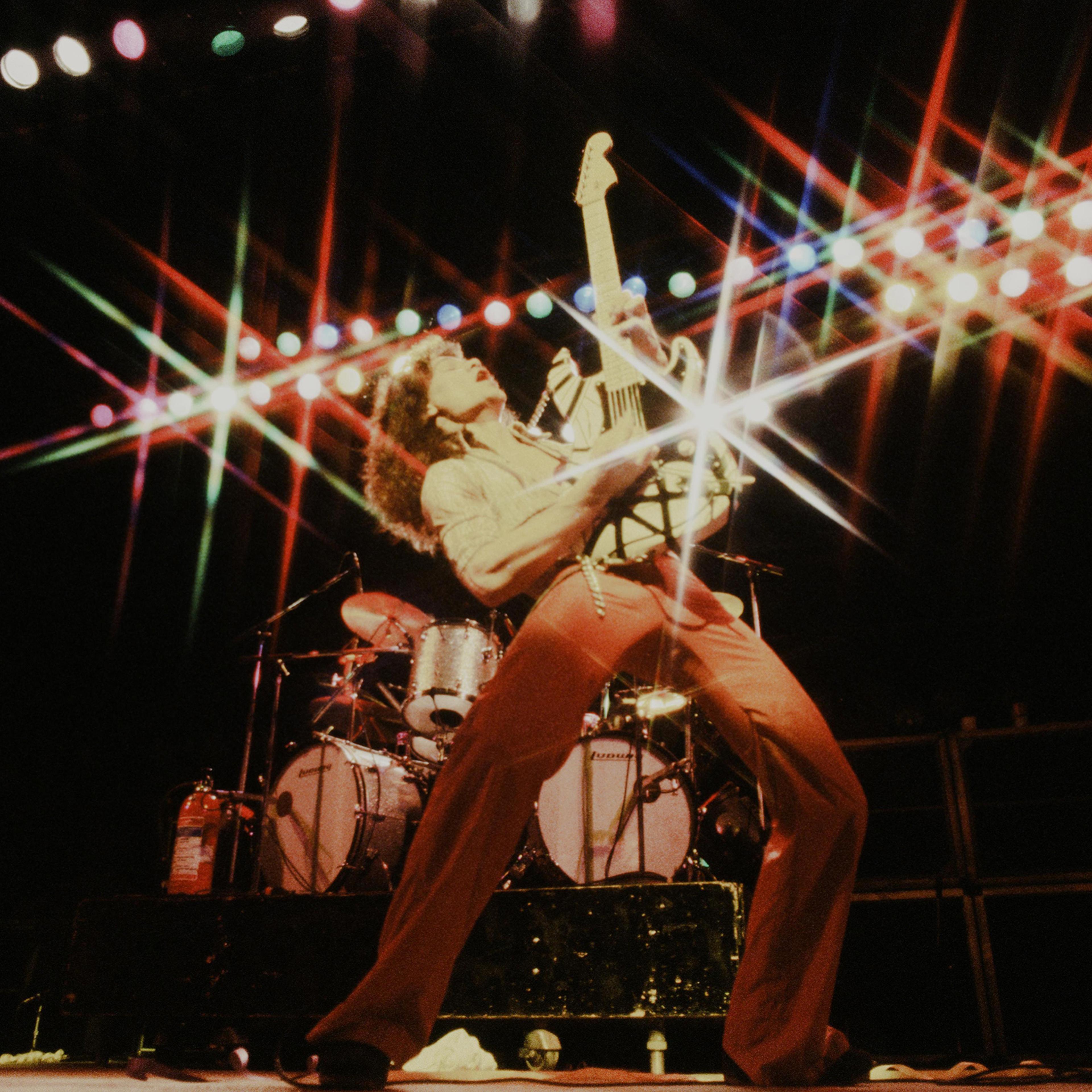 Eddie Van Halen striking a pose at the Kouseinennkinn-kaikan, Tokyo, June 1978