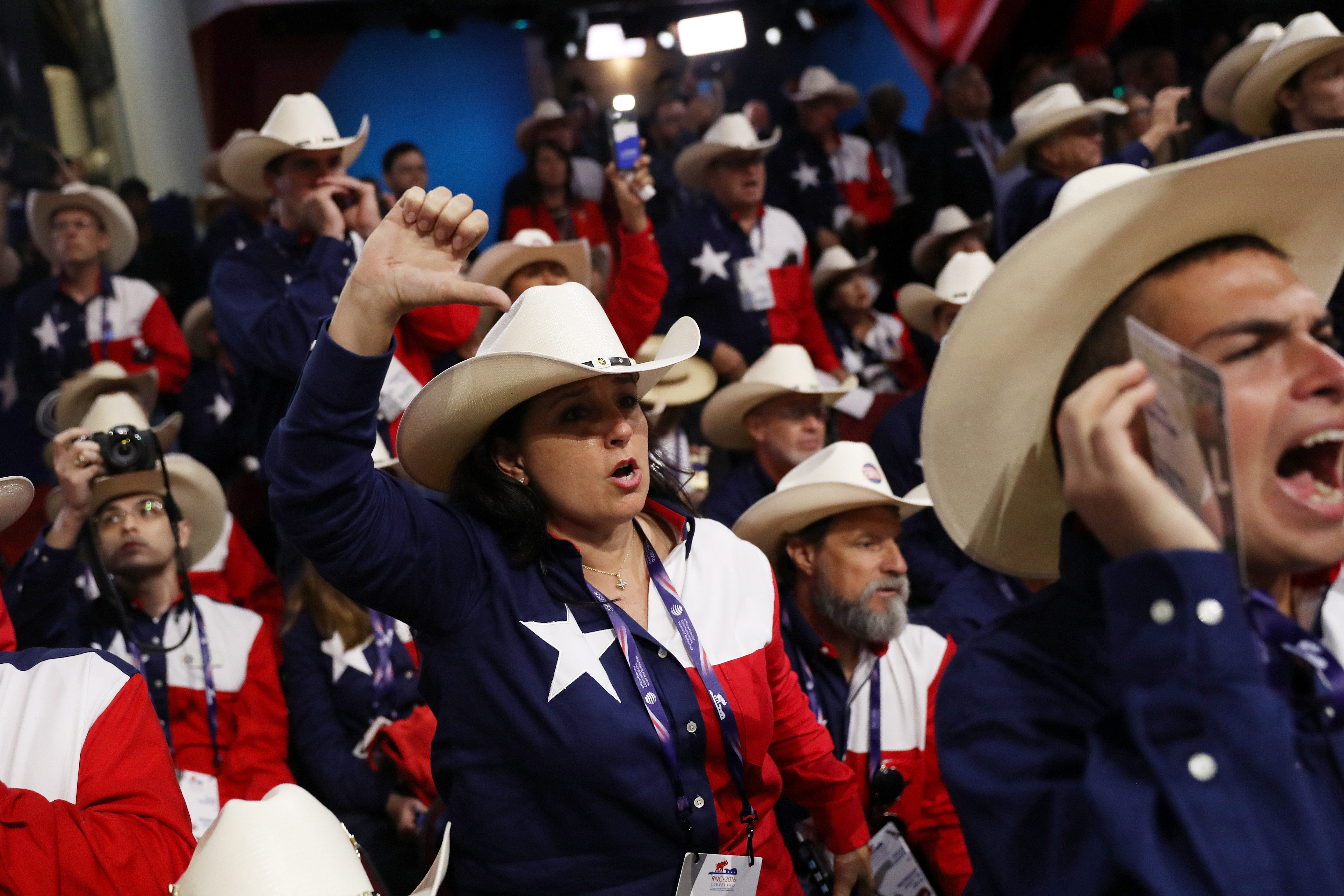 Delegates from Texas oppose a roll call vote on the floor during on the first day of the Republican National Convention on July 18, 2016 at the Quicken Loans Arena in Cleveland.