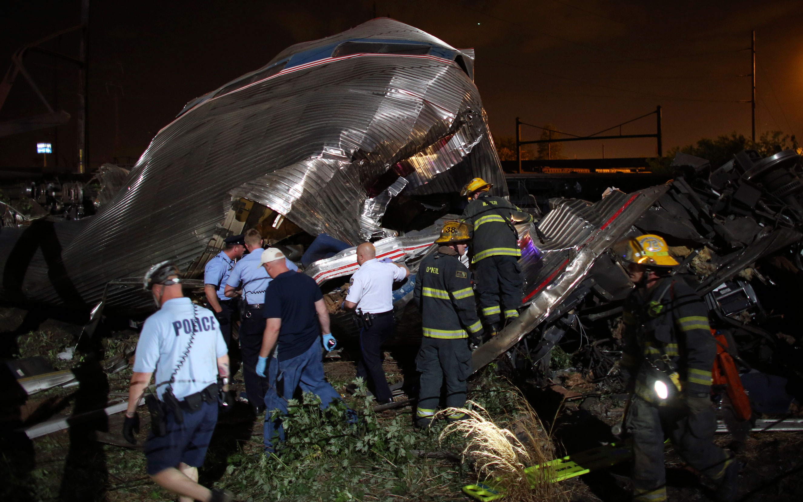 Emergency personnel work the scene of the Amtrak train wreck on May 12, 2015 in Philadelphia.