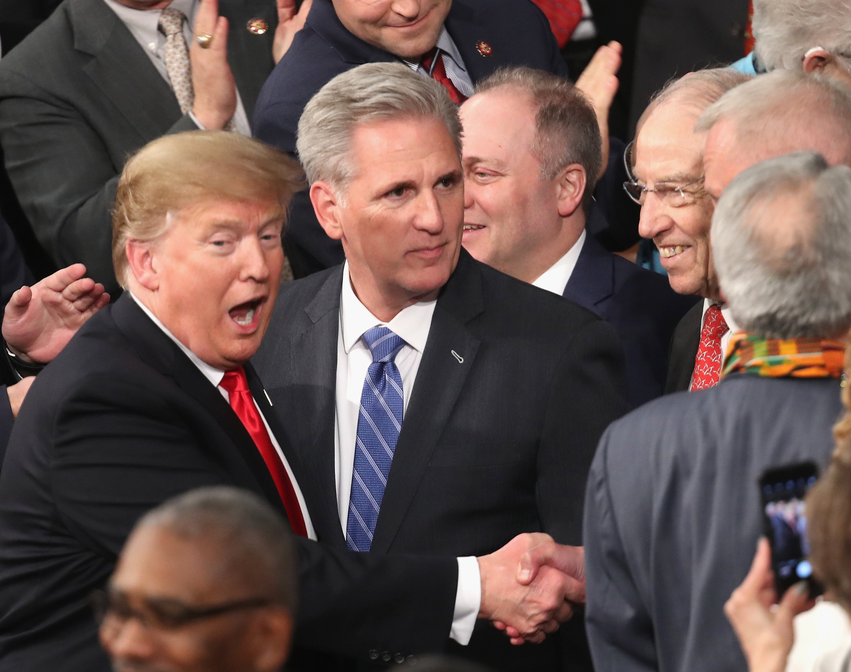 President Donald Trump greets lawmakers ahead of the State of the Union address in the chamber of the U.S. House of Representatives at the U.S. Capitol Building on February 5, 2019 in Washington, DC. 