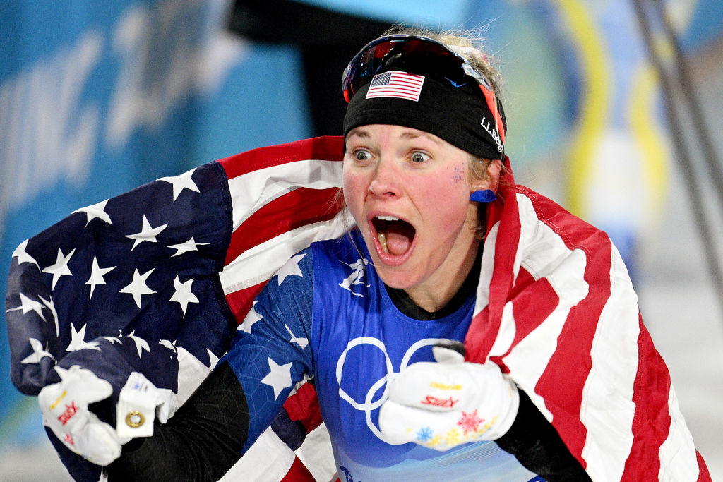 American Jessie Diggins celebrates after winning the bronze medal during the women's cross-country sprint free final at the Beijing Winter Olympics.