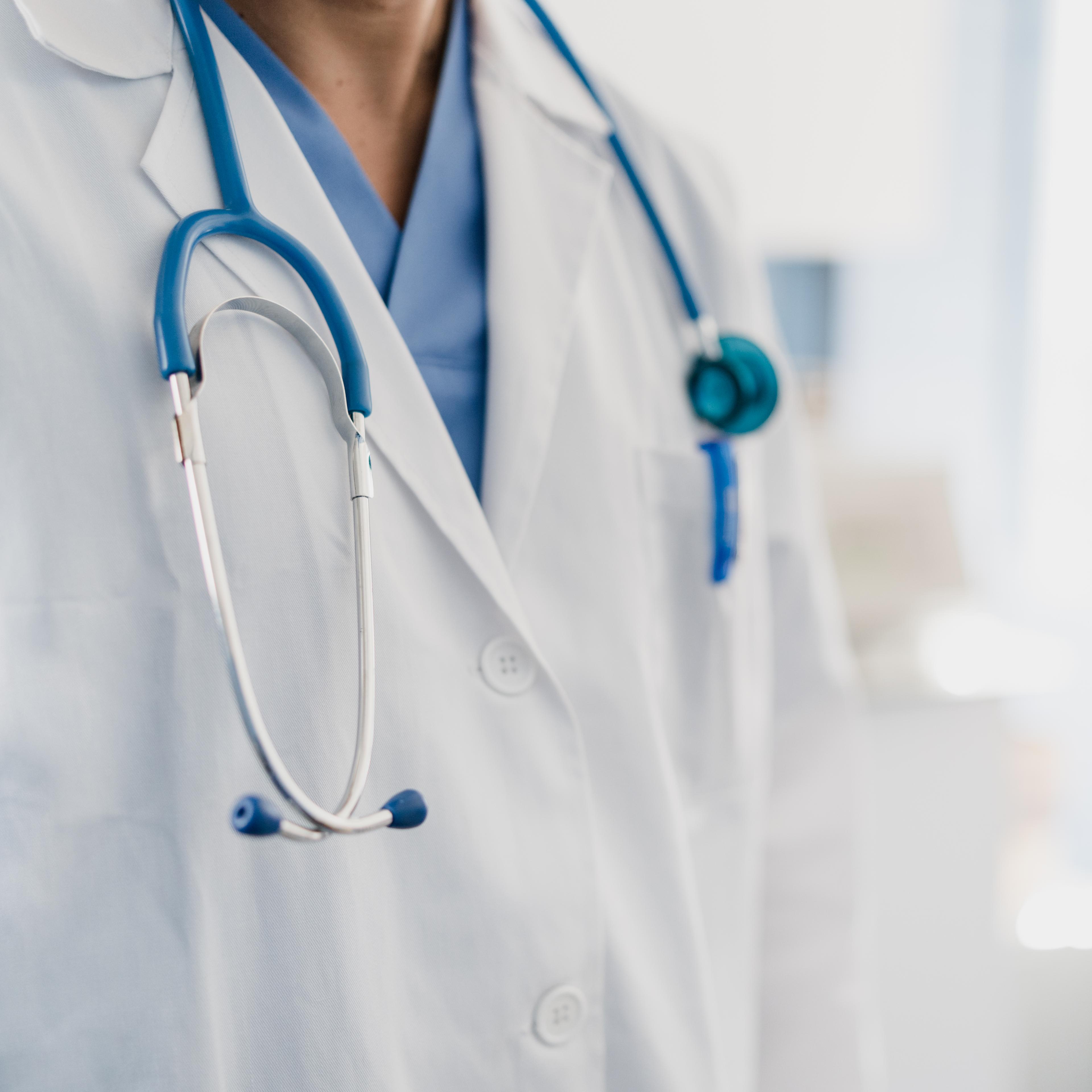 close-up of a doctor's gown with stethoscope