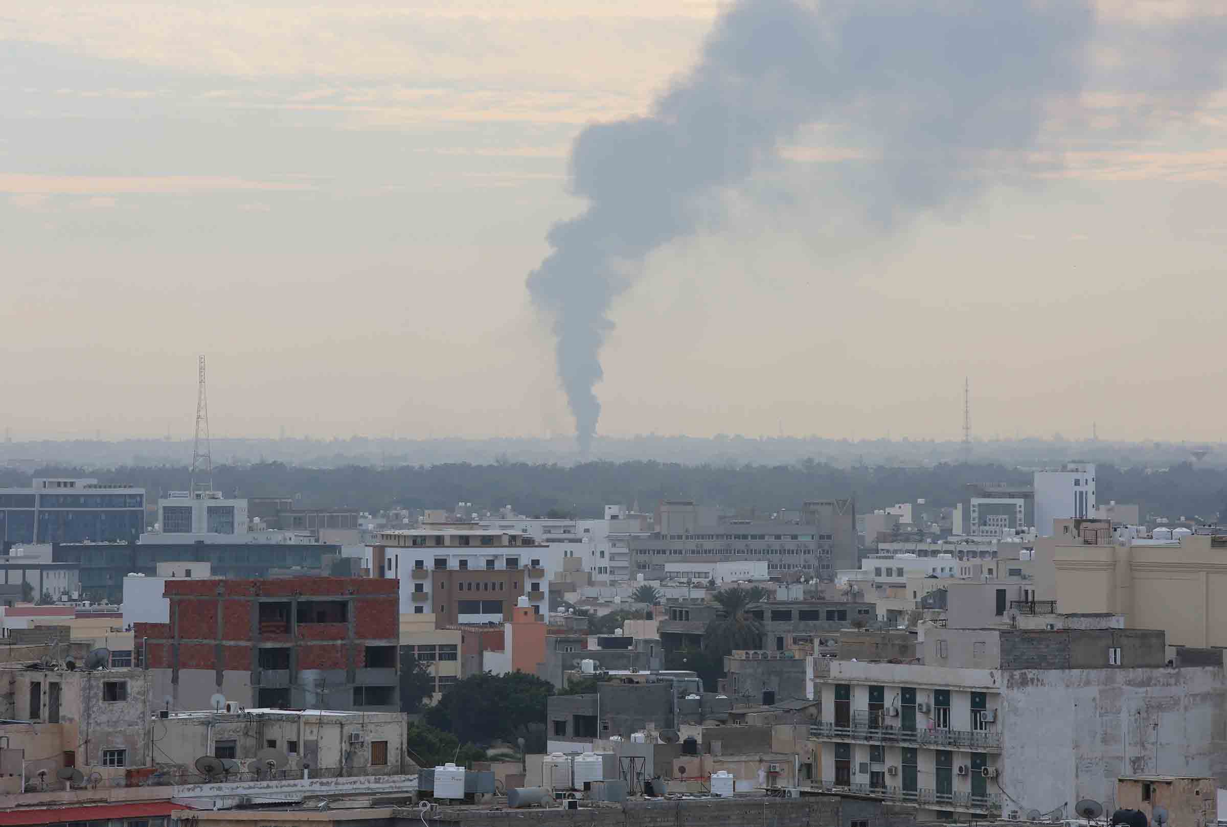 TRIPOLI, LIBYA - JANUARY 19: Smoke rises after forces of Warlord Khalifa Haftar attacked to capital Tripoli, Libya on January 19, 2020. Haftars forces had again violated the cease-fire which started early last Sunday.