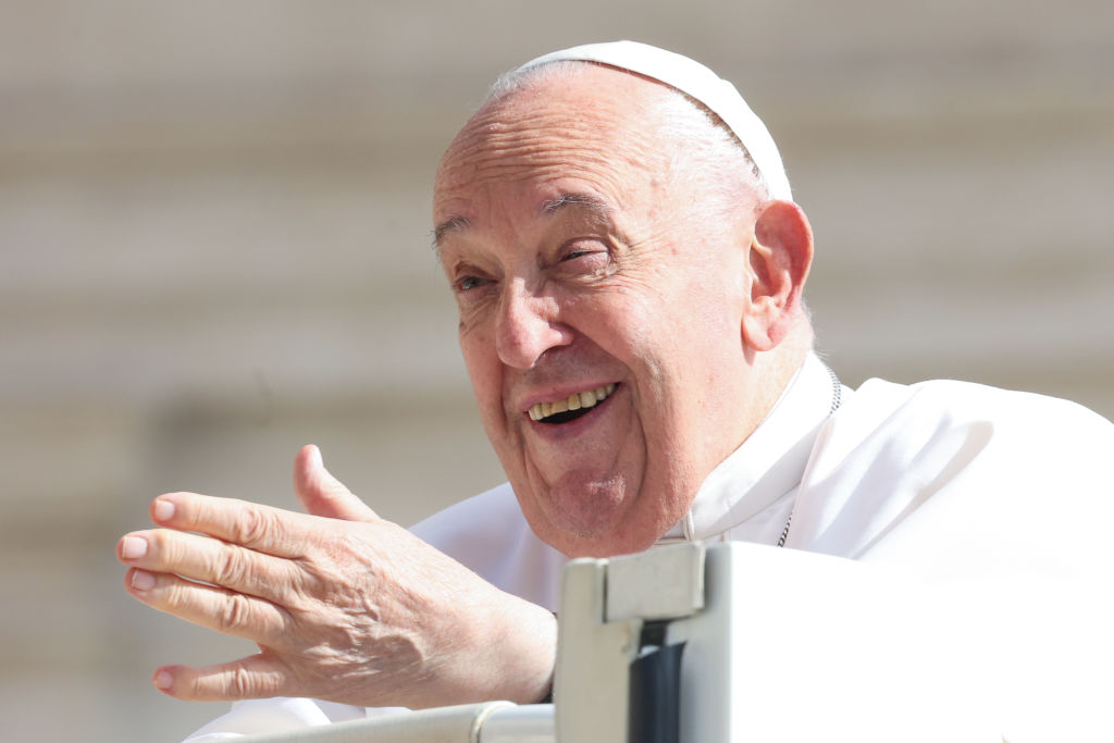 Pope Francis waves to the faithful as he arrives in St. Peter's Square for his weekly audience on May 22, 2024 in Vatican City, Vatican.