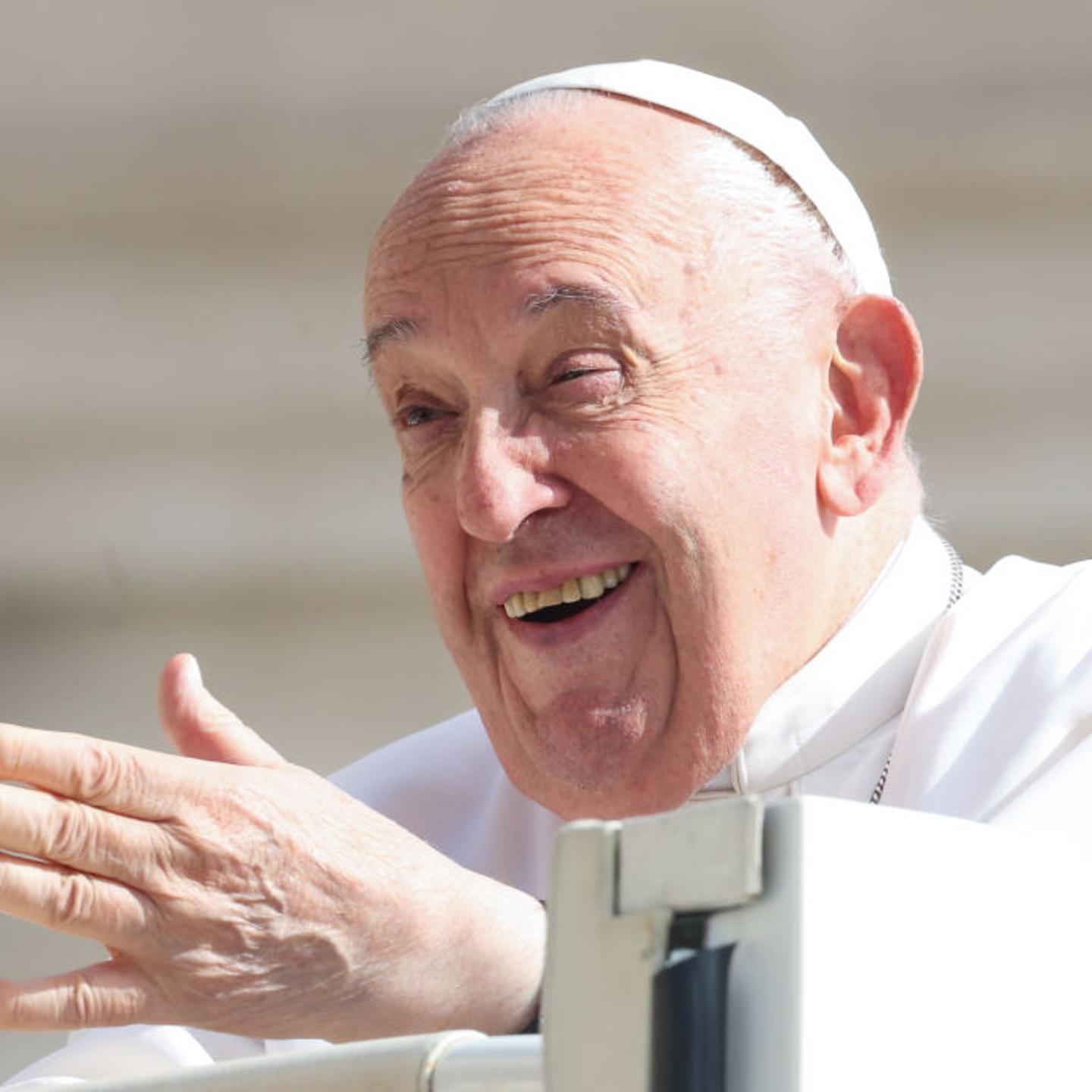 Pope Francis waves to the faithful as he arrives in St. Peter's Square for his weekly audience on May 22, 2024 in Vatican City, Vatican.