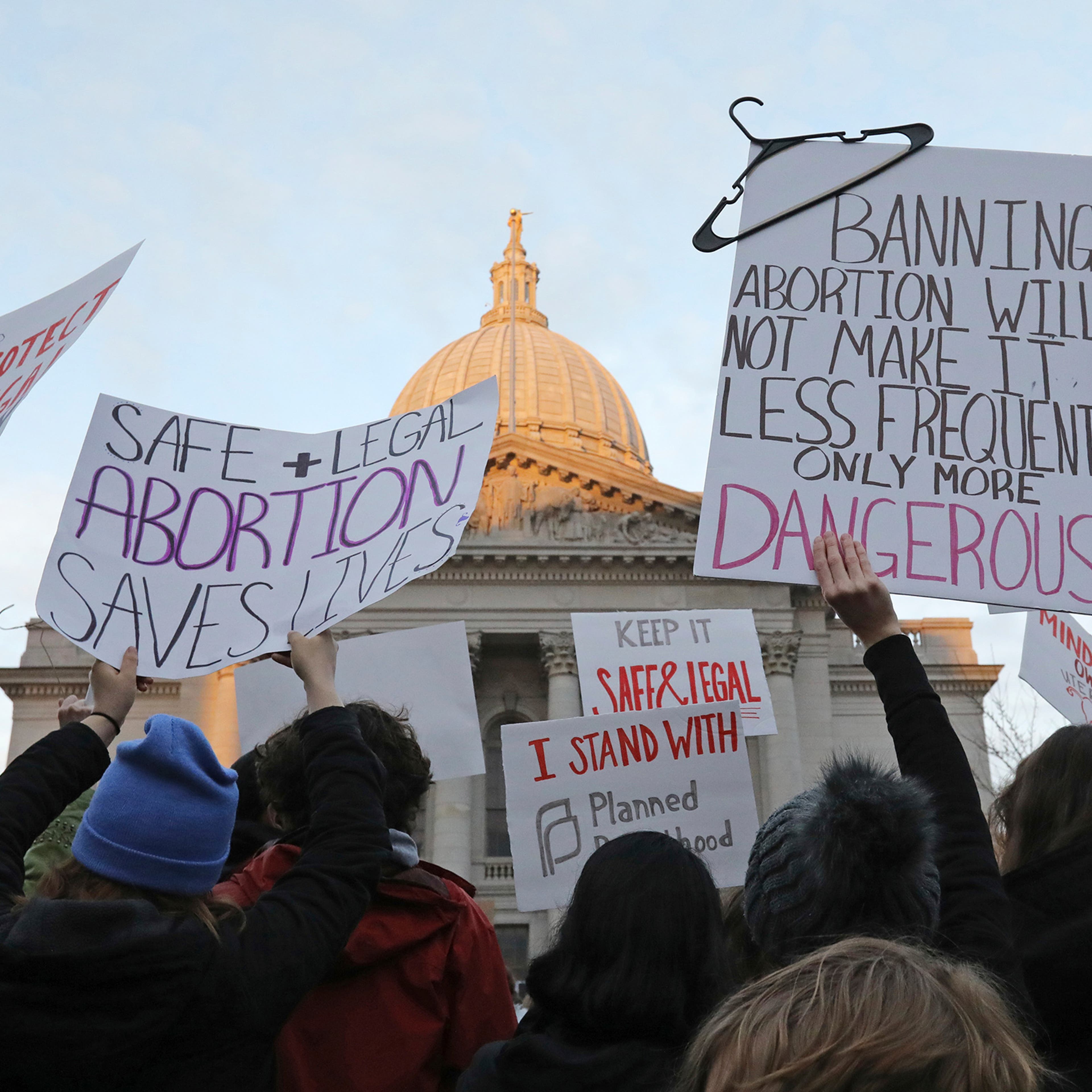 Demonstrators protest outside the state Capitol in Madison, Wis., on May 3, 2022.